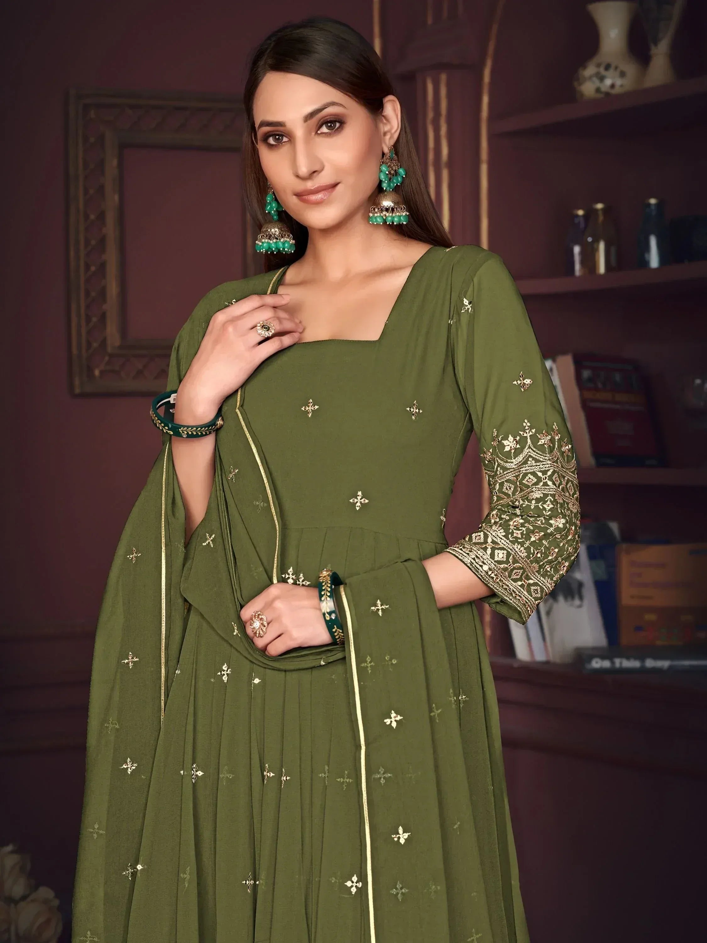 Olive green embroidered salwar kameez with gold detailing, perfect for Indian ethnic wear occasions