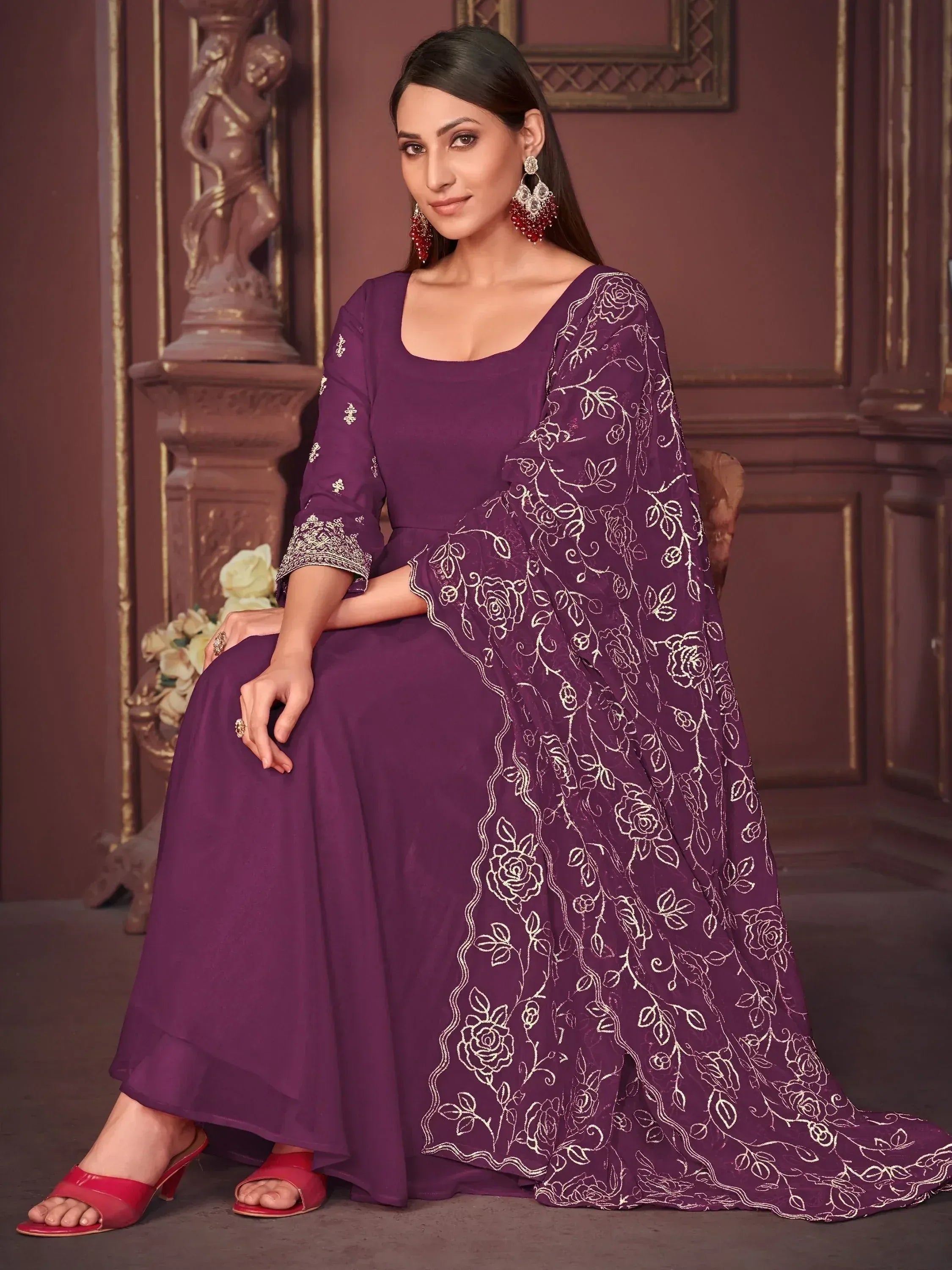 Purple ethnic gown with floral embroidery, perfect for Indian celebrations and events.