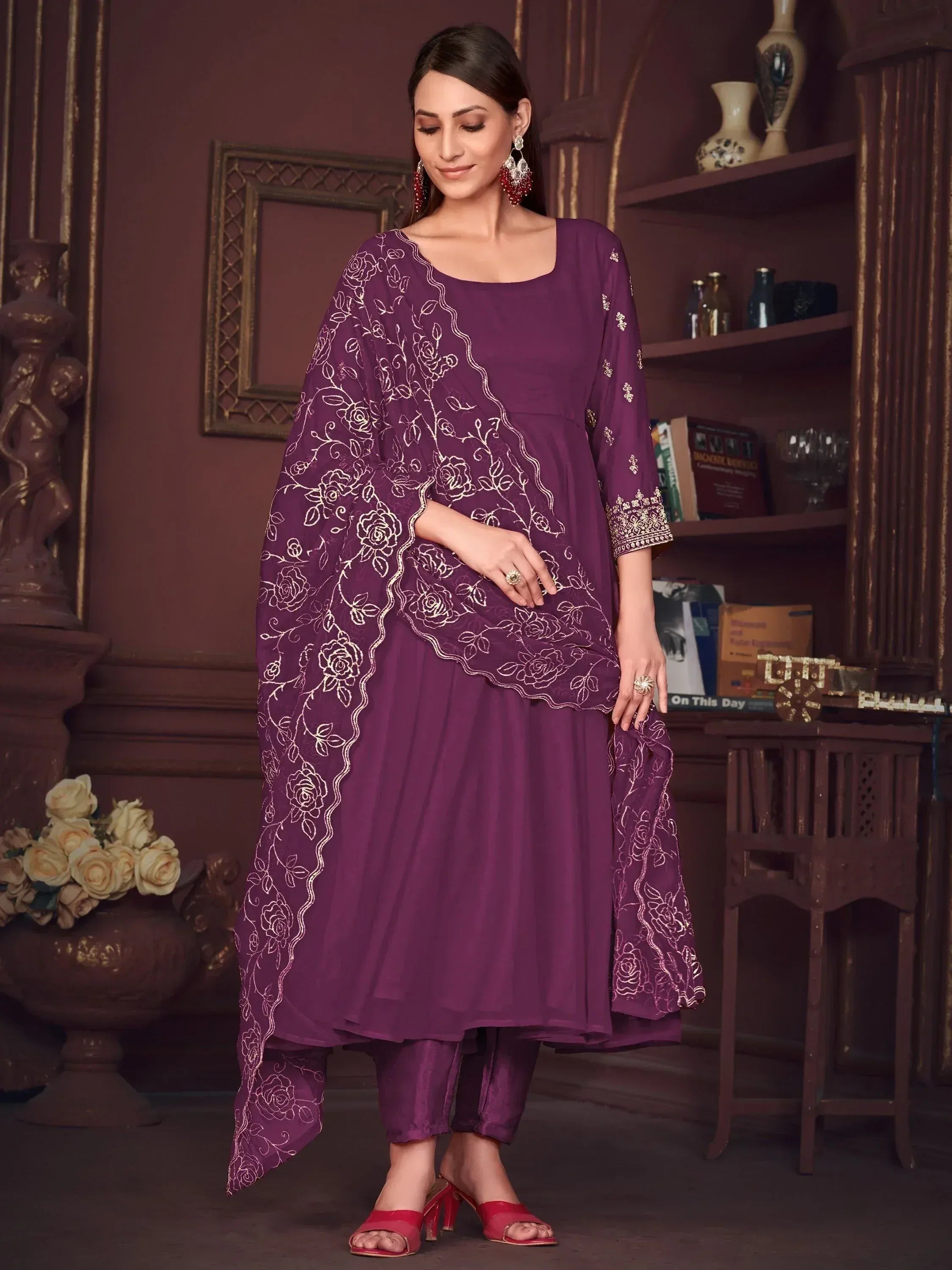 Purple embroidered salwar kameez with floral dupatta, perfect for Indian ethnic wear occasions.