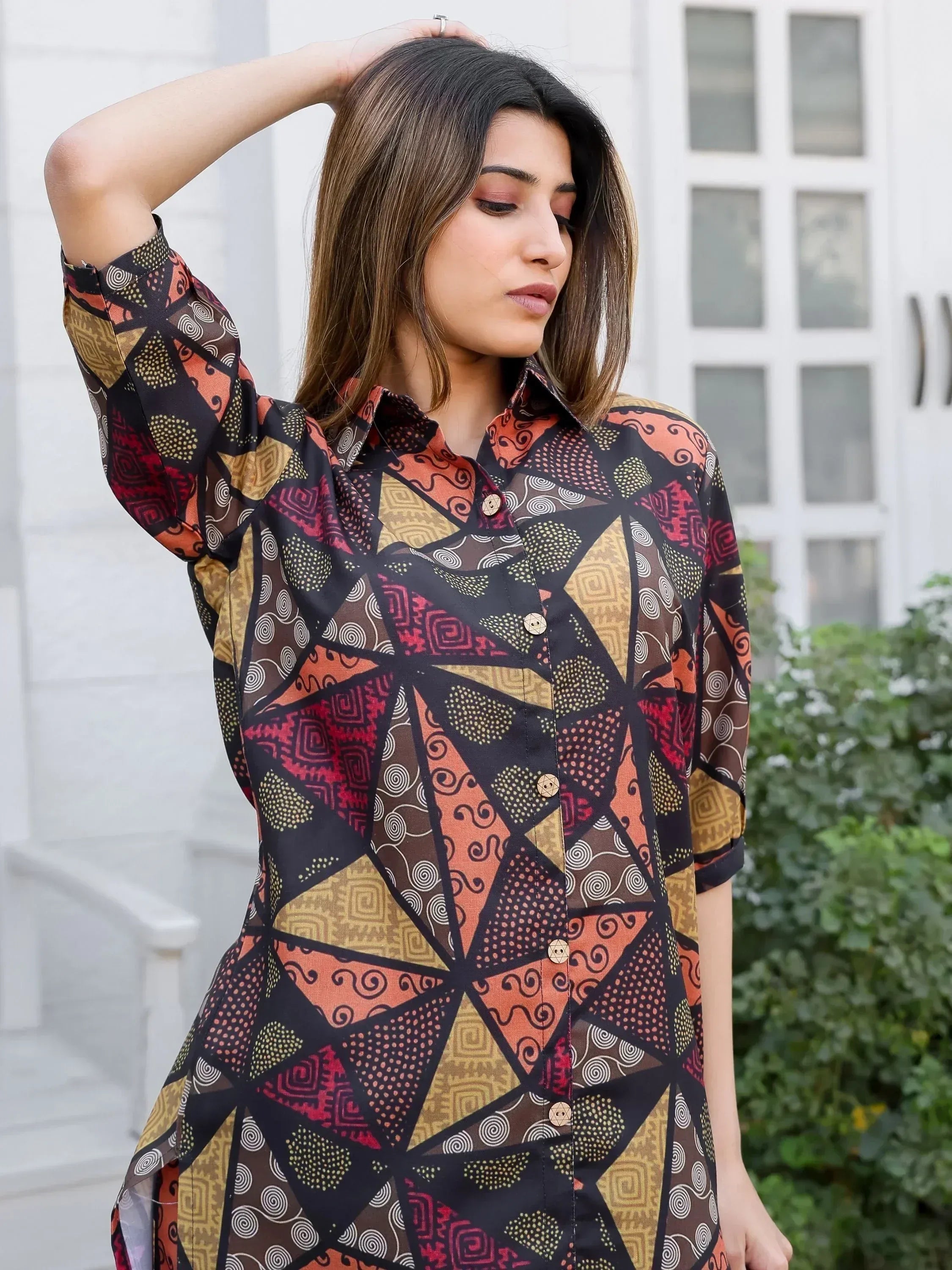 Woman in ethnic printed kurta with geometric patterns, perfect for Indian wear