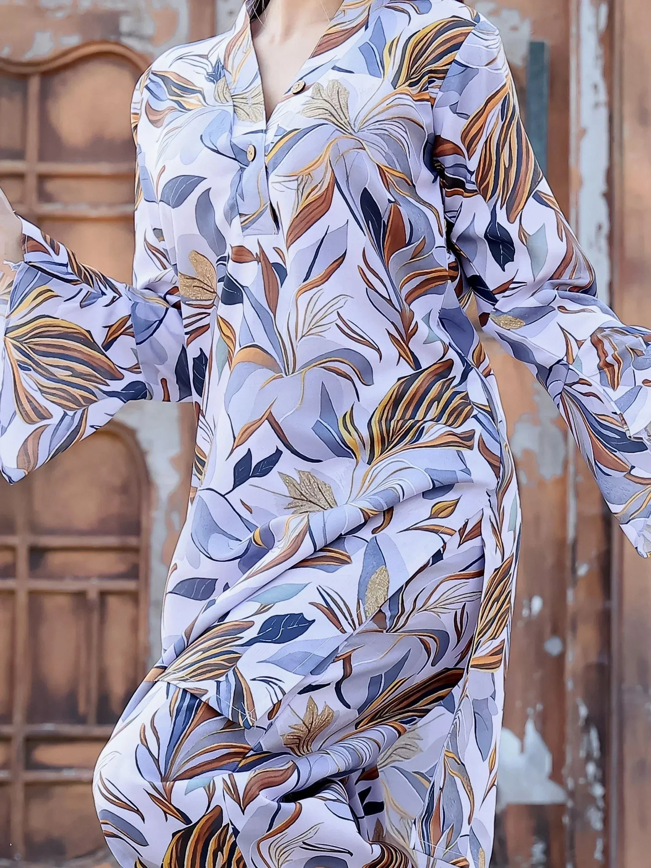 Floral print ethnic gown with bell sleeves, perfect for Indian wear occasions