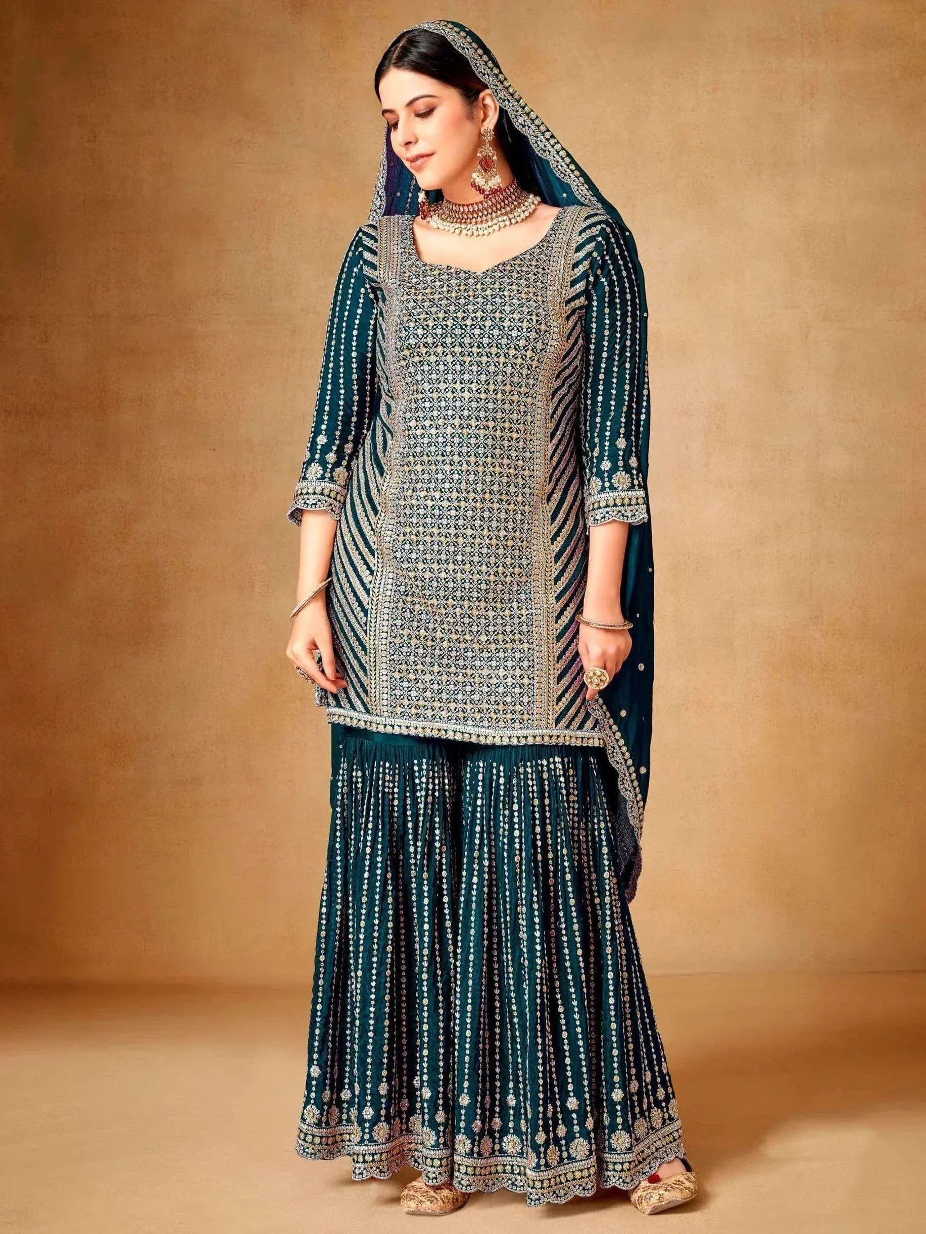 Elegant teal embroidered salwar kameez with matching dupatta, perfect for Indian ethnic wear