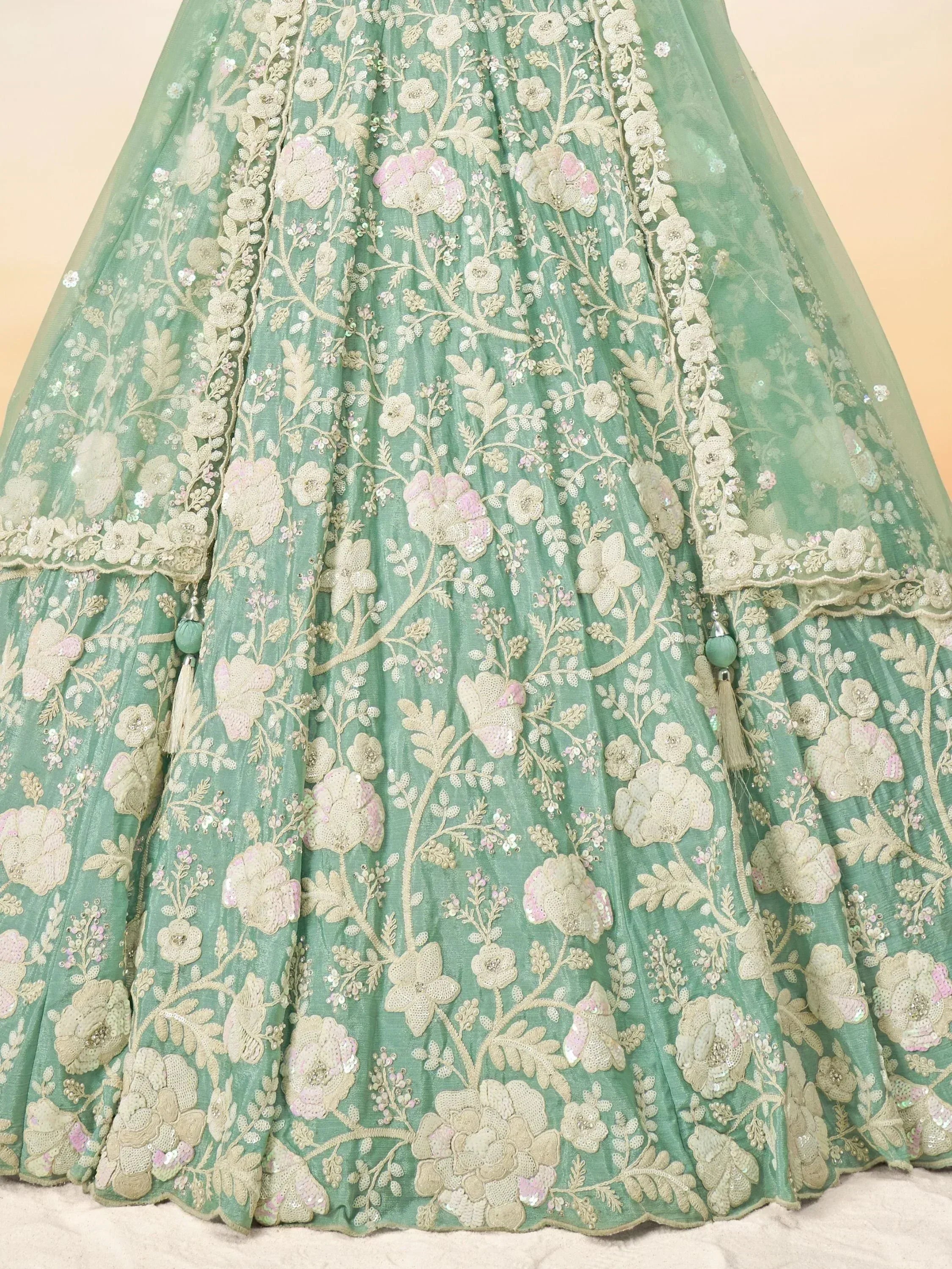 Mint green lehenga with floral embroidery and sequin detailing for Indian ethnic wear