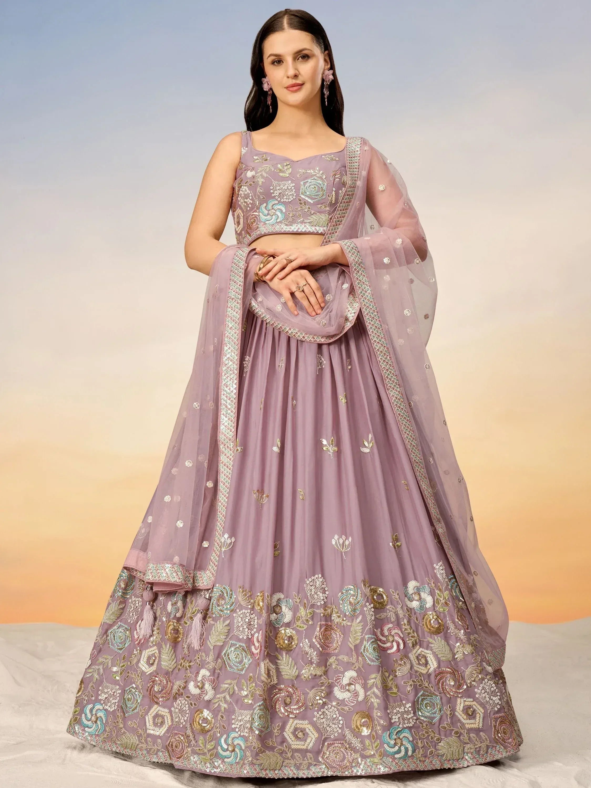 Elegant lavender lehenga choli with floral embroidery and sheer dupatta for Indian ethnic wear
