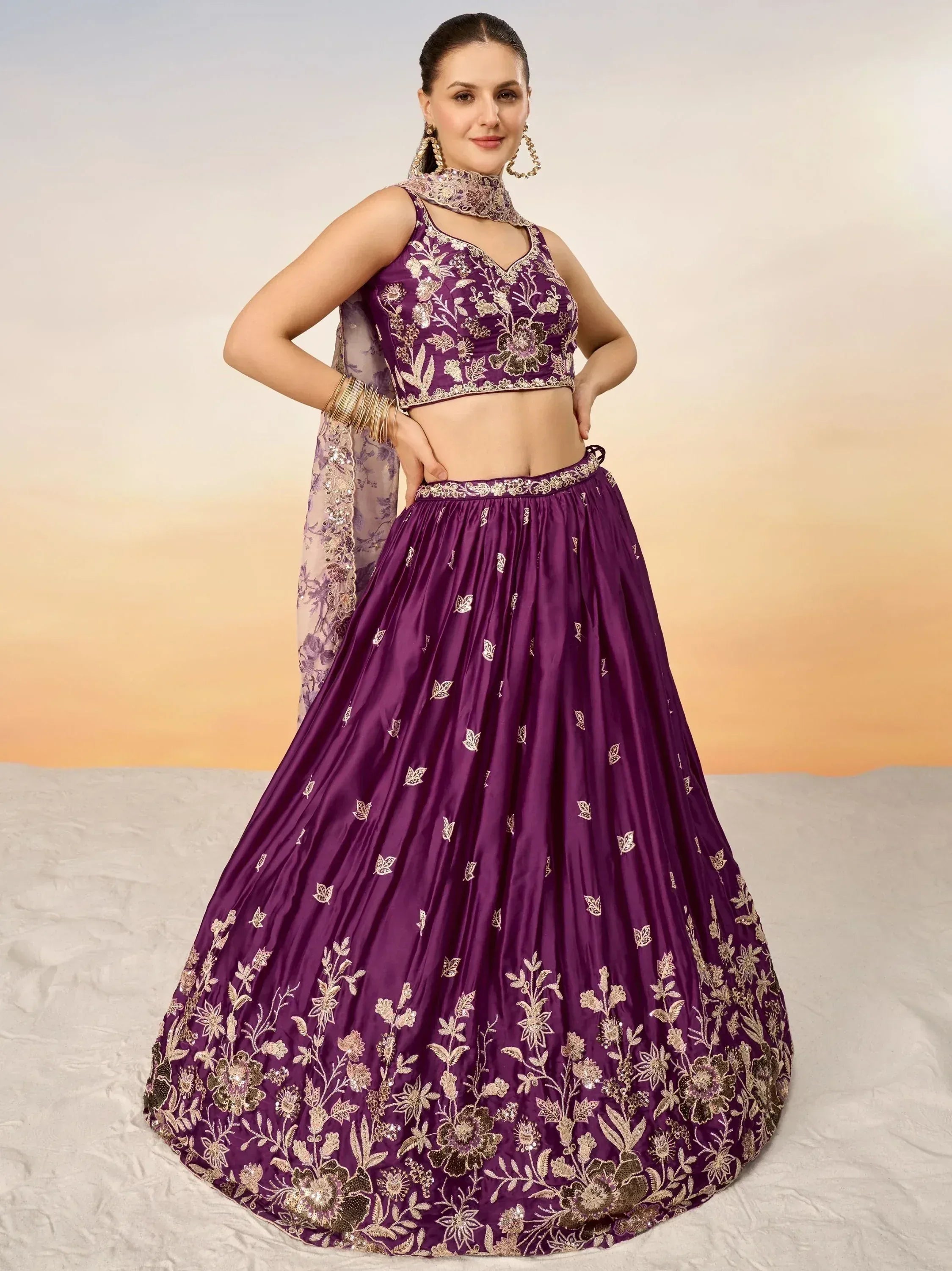 Purple floral embroidered lehenga choli with gold detailing, perfect for Indian ethnic occasions