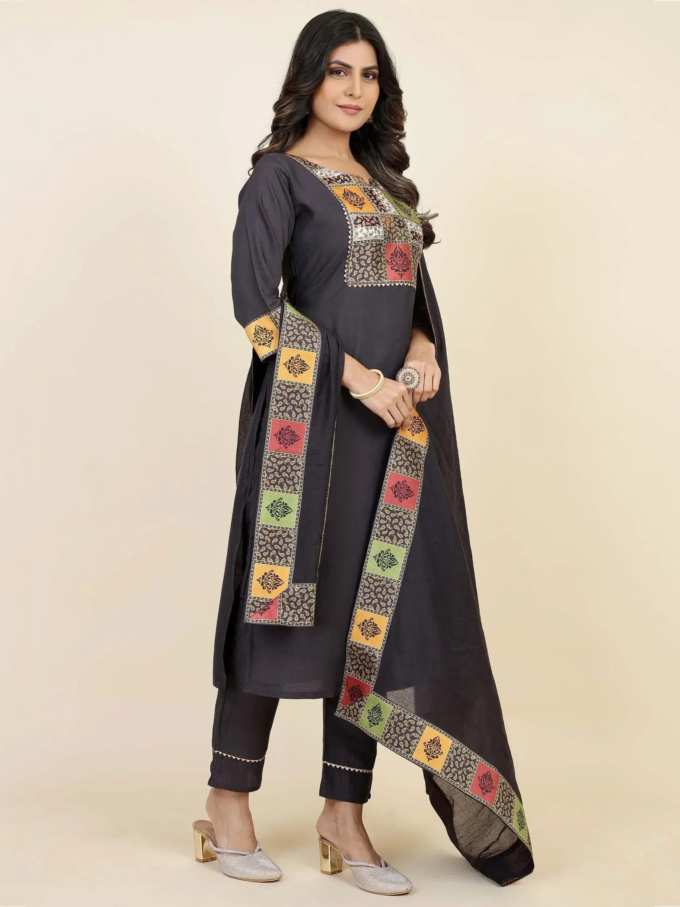 Black ethnic salwar kameez with colorful patchwork design and matching dupatta
