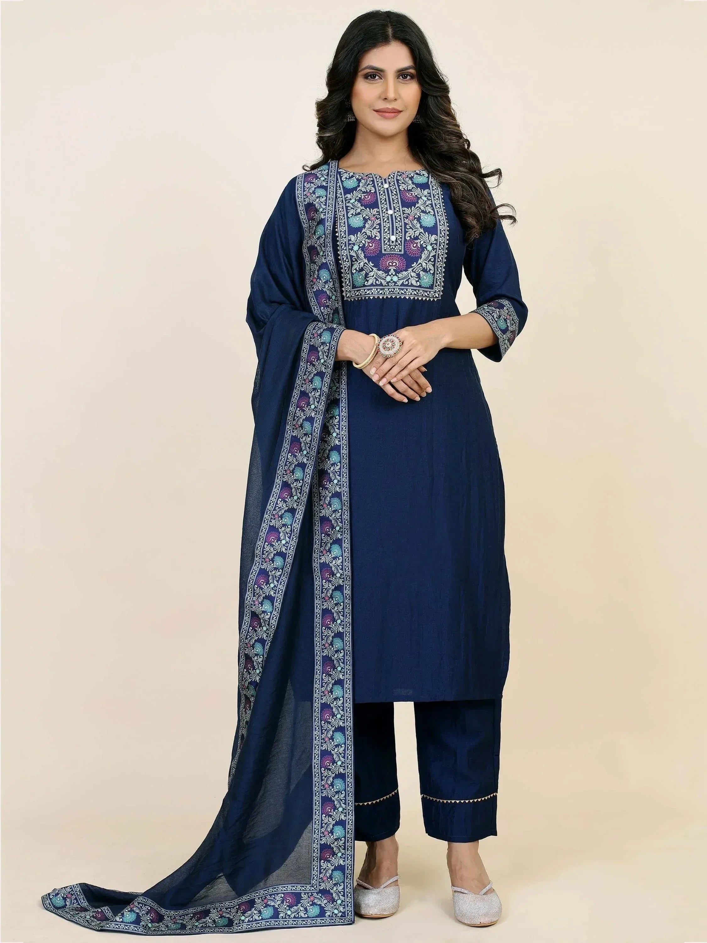 Navy blue embroidered kurta set with floral dupatta, perfect for Indian ethnic wear occasions.