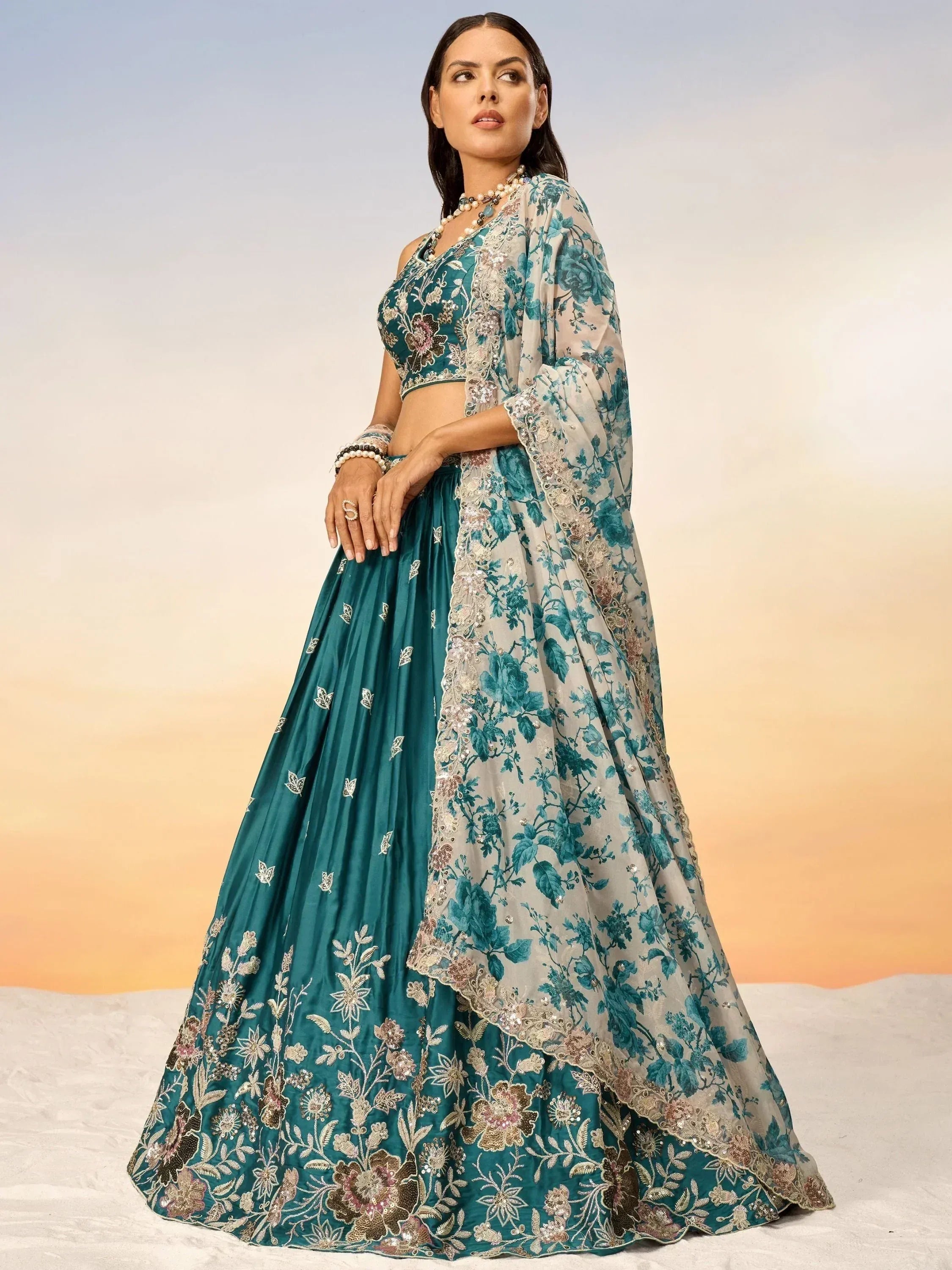 Teal embroidered lehenga choli with floral dupatta, perfect for Indian ethnic wear occasions
