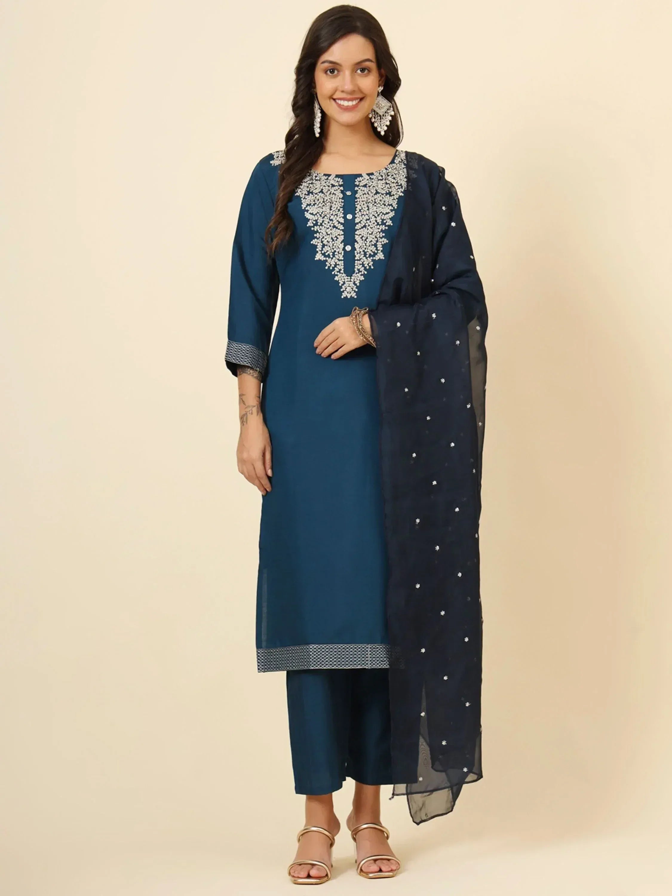 Elegant blue ethnic salwar kameez with intricate white embroidery and matching dupatta for festive occasions