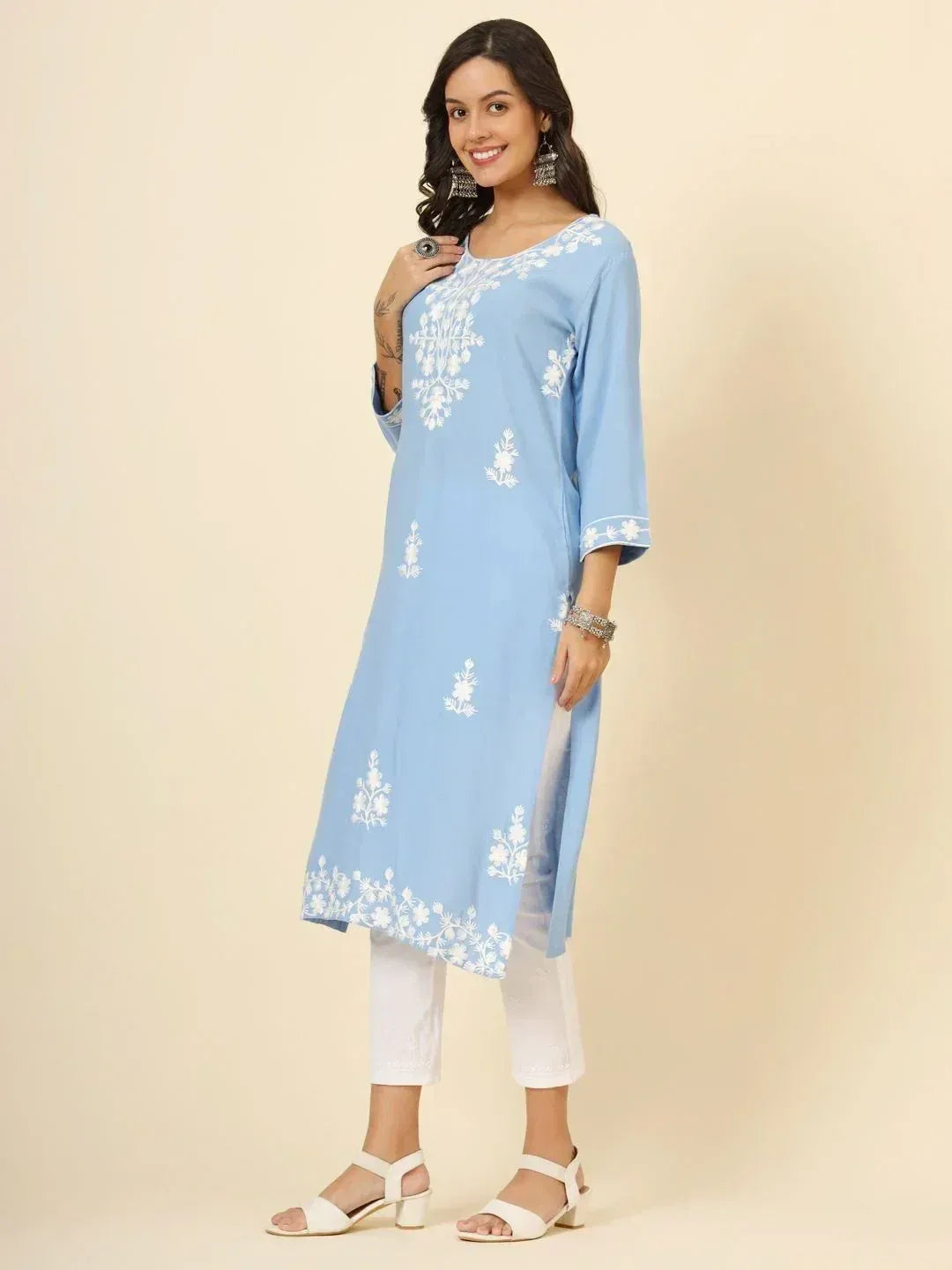 Light blue embroidered kurta with white pants, perfect for ethnic wear styling.