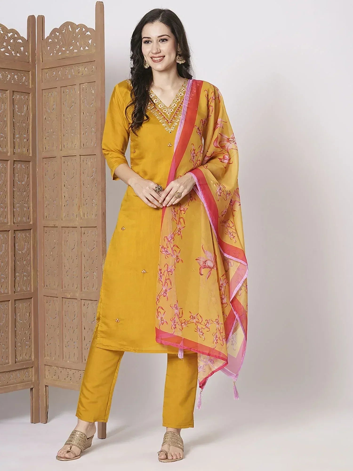 Yellow ethnic salwar kameez with floral dupatta, perfect for Indian wear and festive occasions