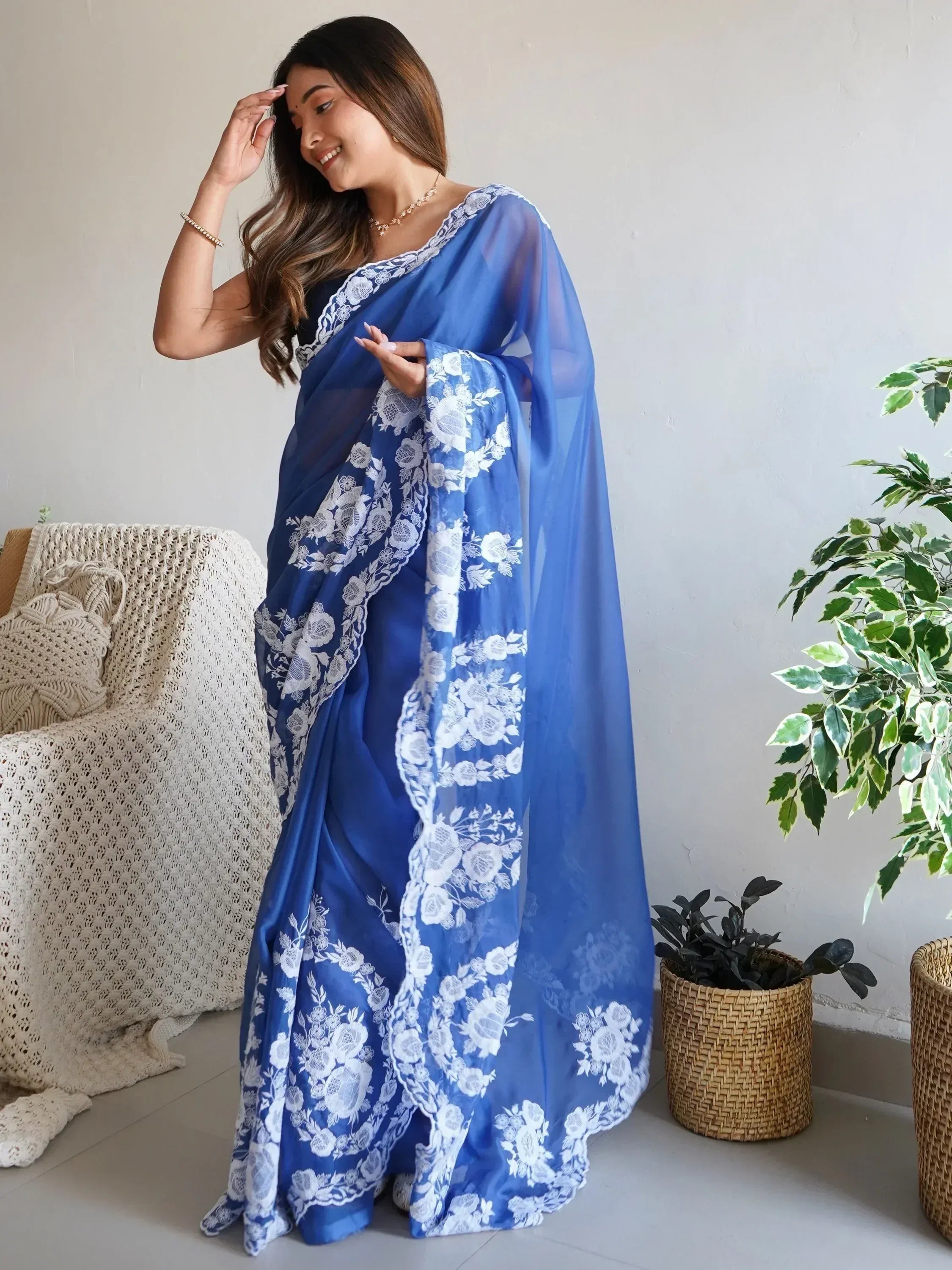 Blue saree with white floral embroidery, elegant ethnic wear for women