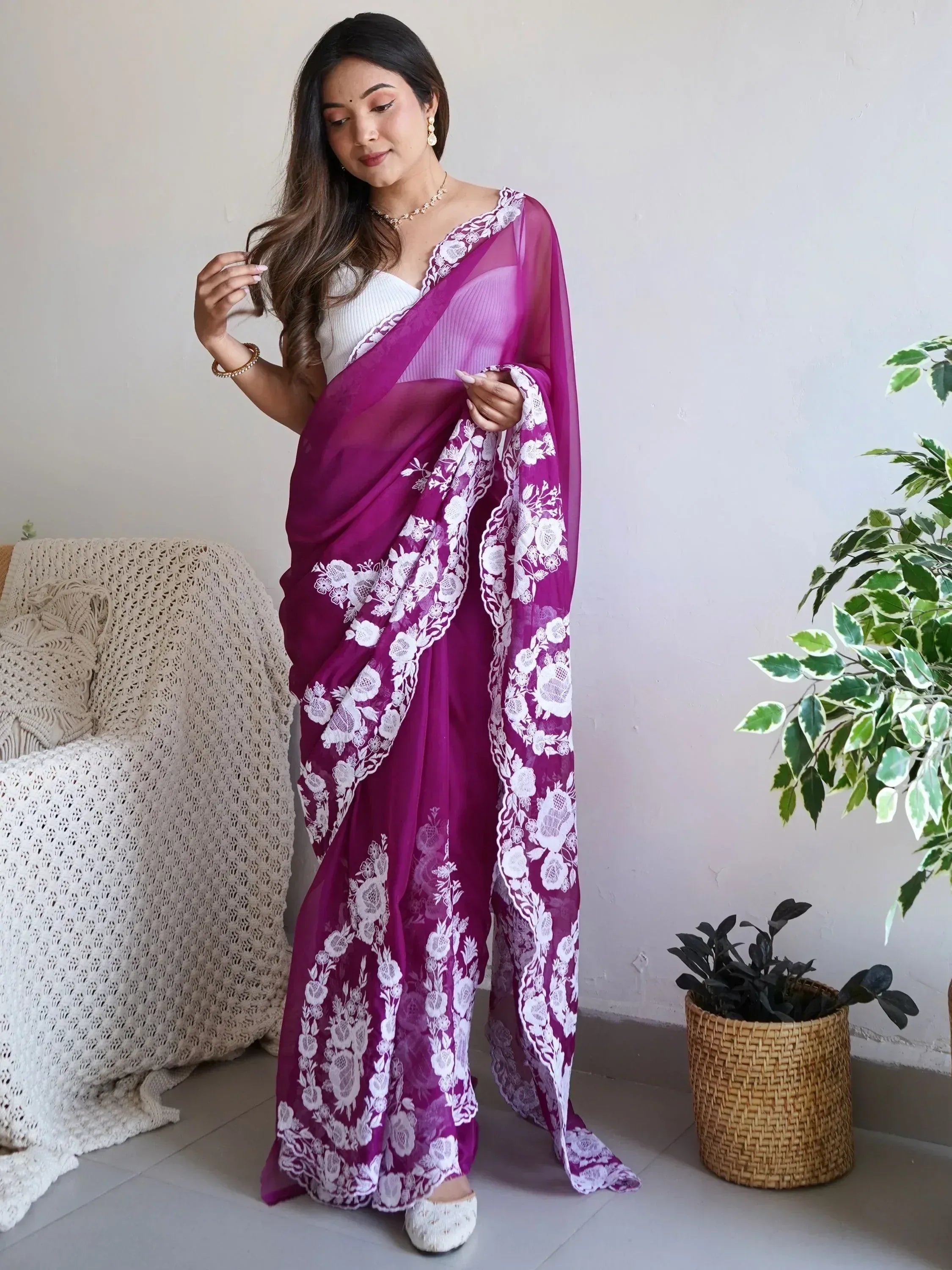 Purple saree with white floral lace, styled with white blouse for ethnic wear