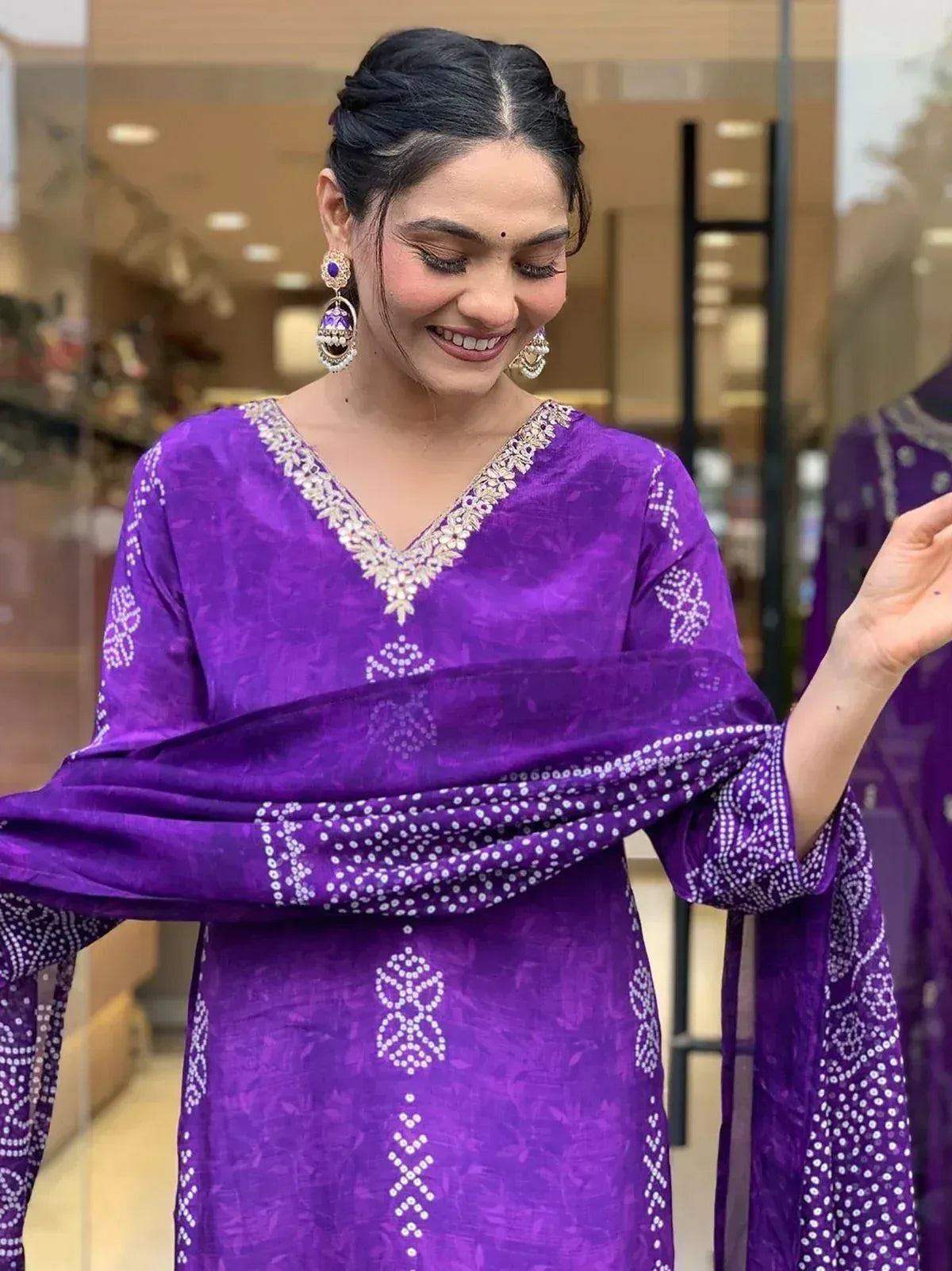 Purple ethnic salwar kameez with white embroidery and matching dupatta, perfect for festive occasions.
