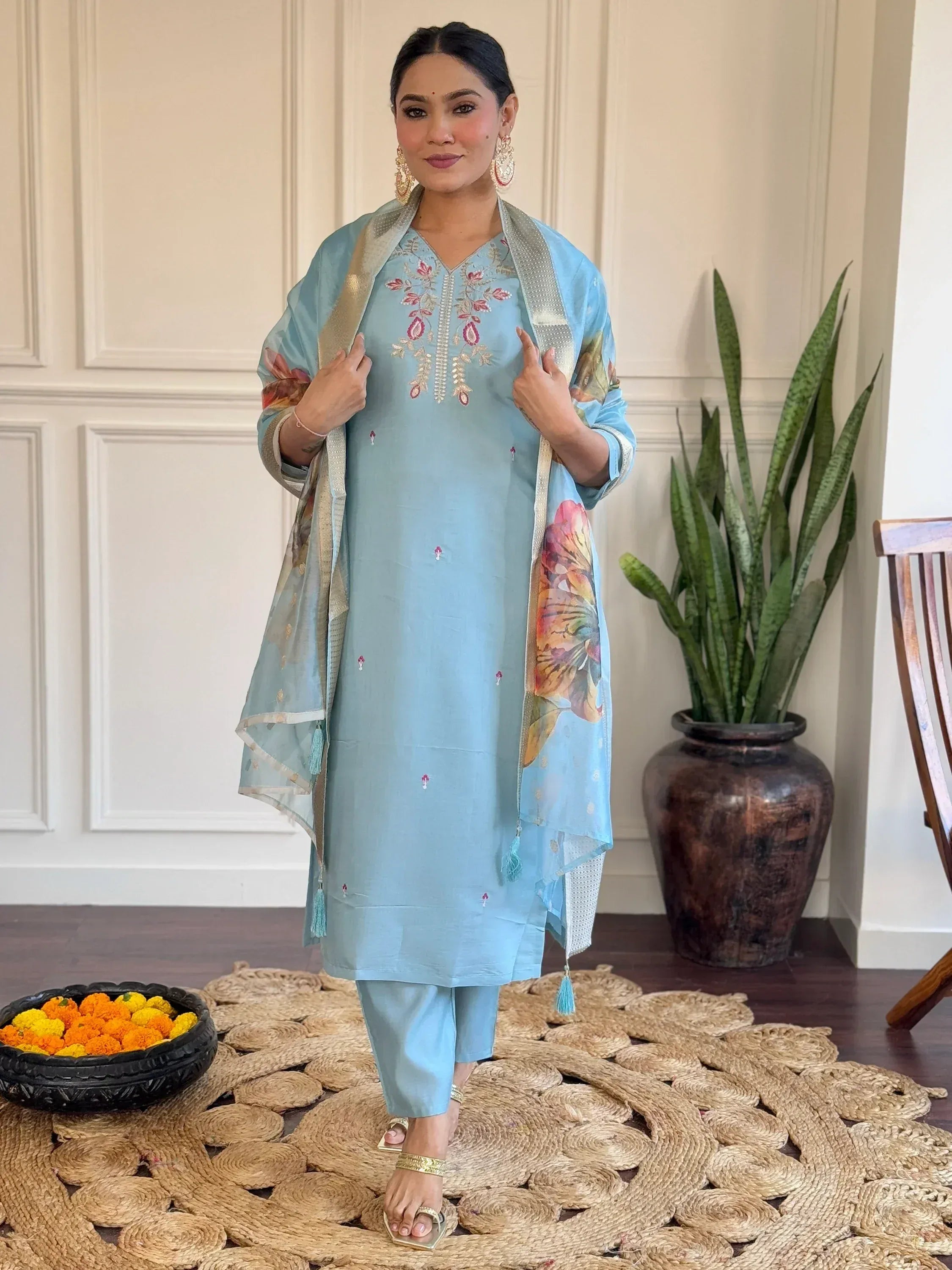 Light blue embroidered salwar kameez with floral dupatta, perfect for Indian ethnic wear occasions