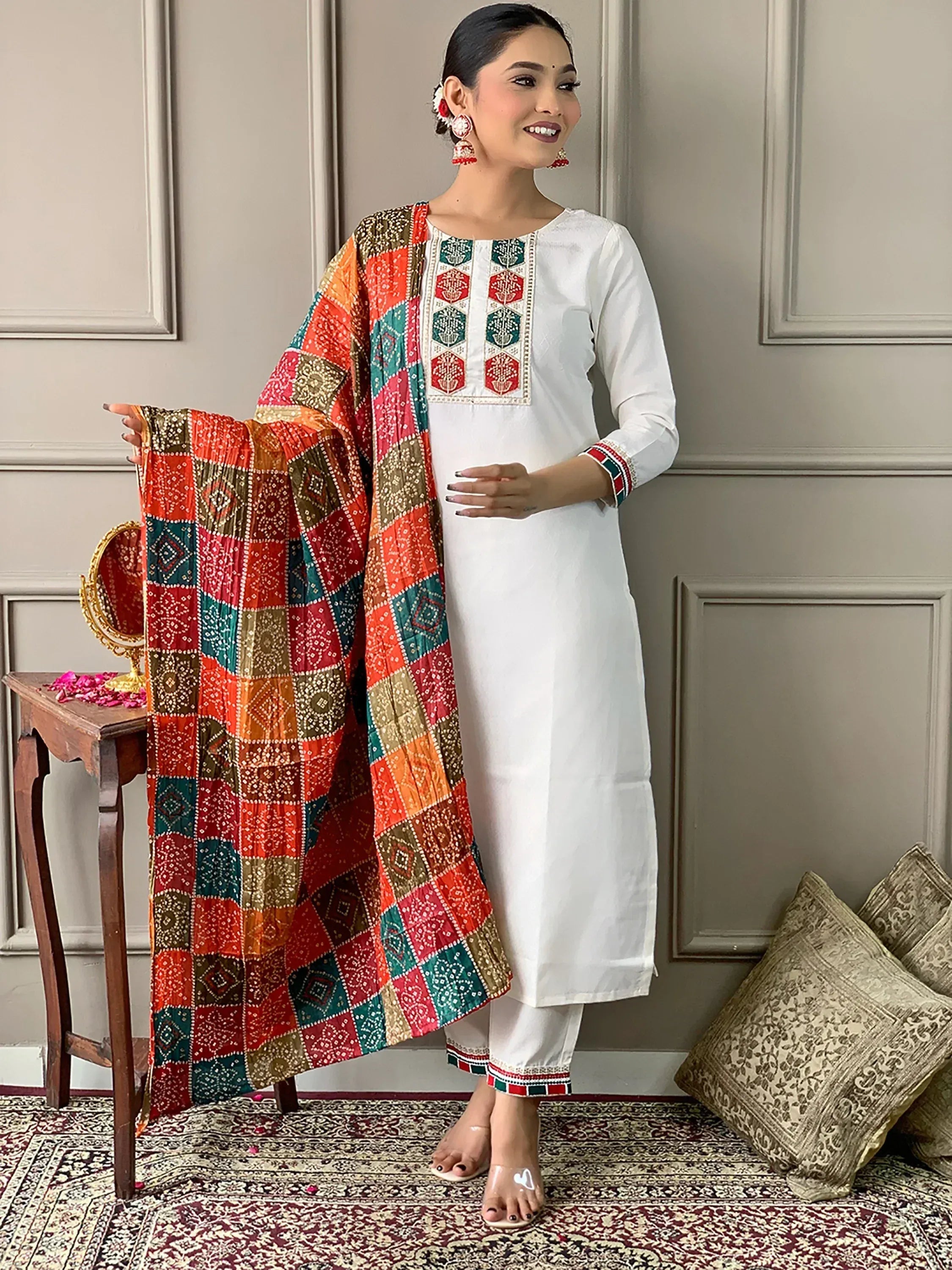 White embroidered kurta with colorful patchwork dupatta, ethnic Indian wear