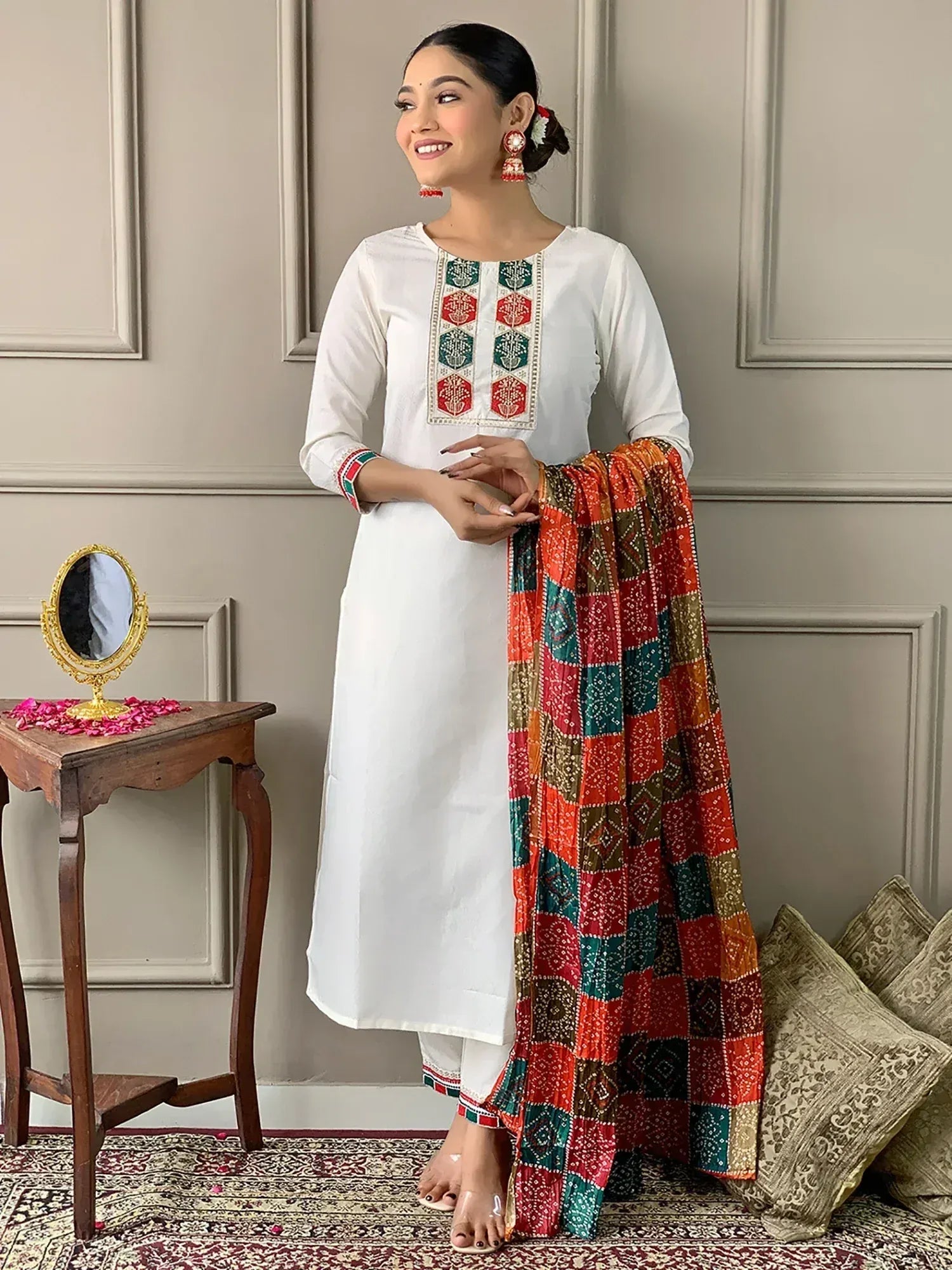 White embroidered kurta with colorful patchwork dupatta, ethnic Indian wear