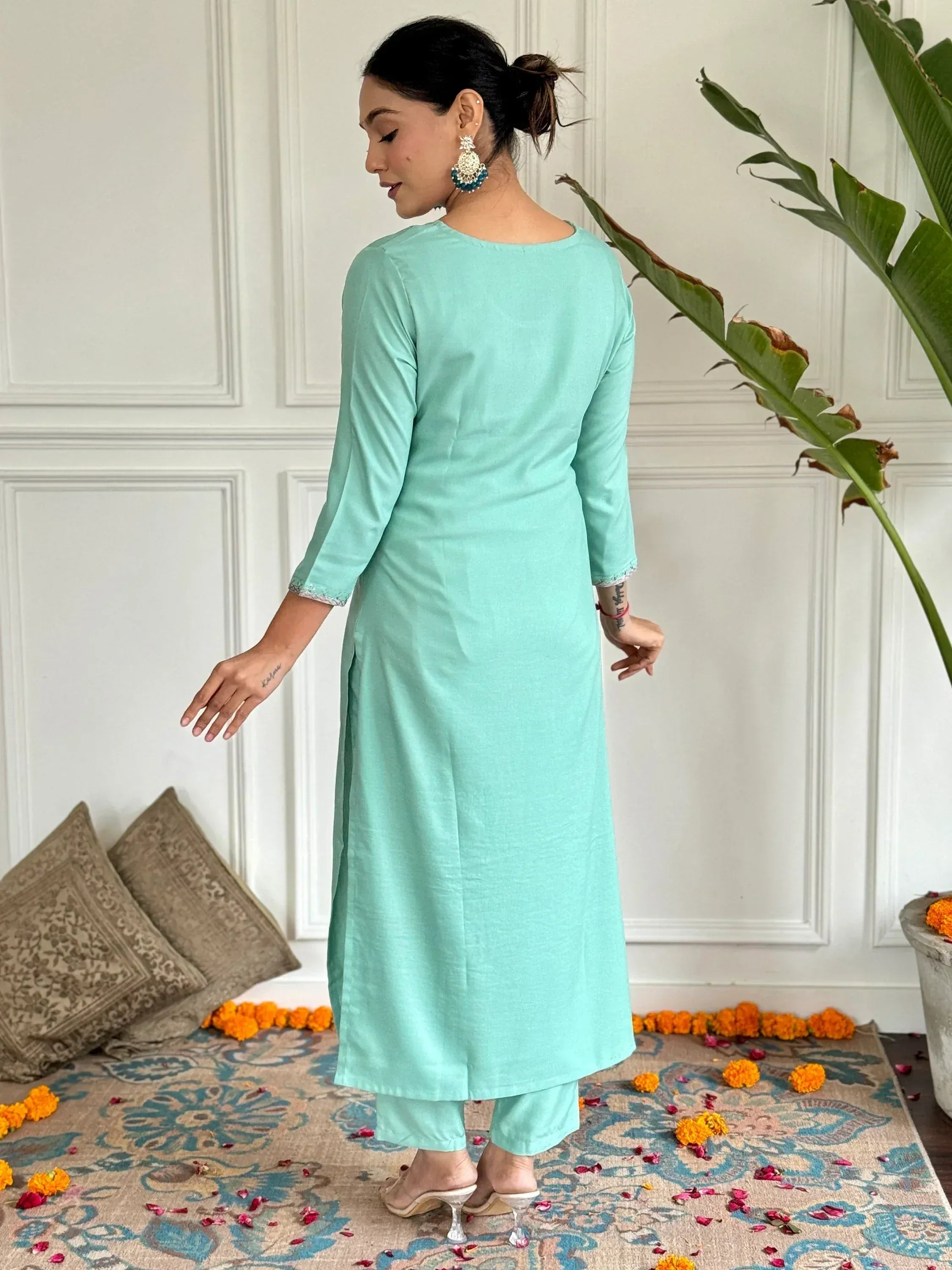 Mint green ethnic kurta with matching pants, perfect for Indian wear and festive occasions.