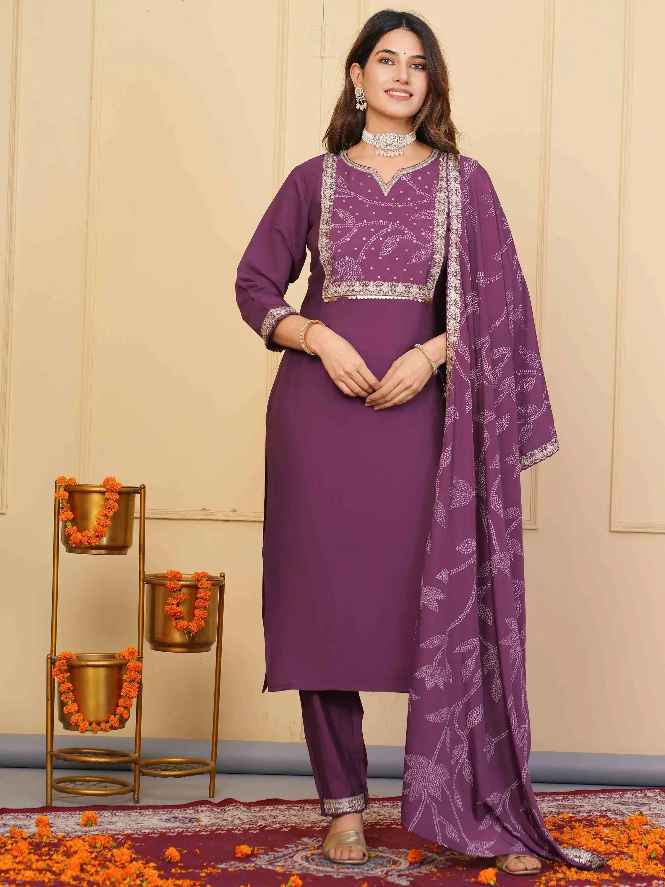 Purple embroidered salwar kameez with matching dupatta, perfect for Indian ethnic occasions and festive wear.