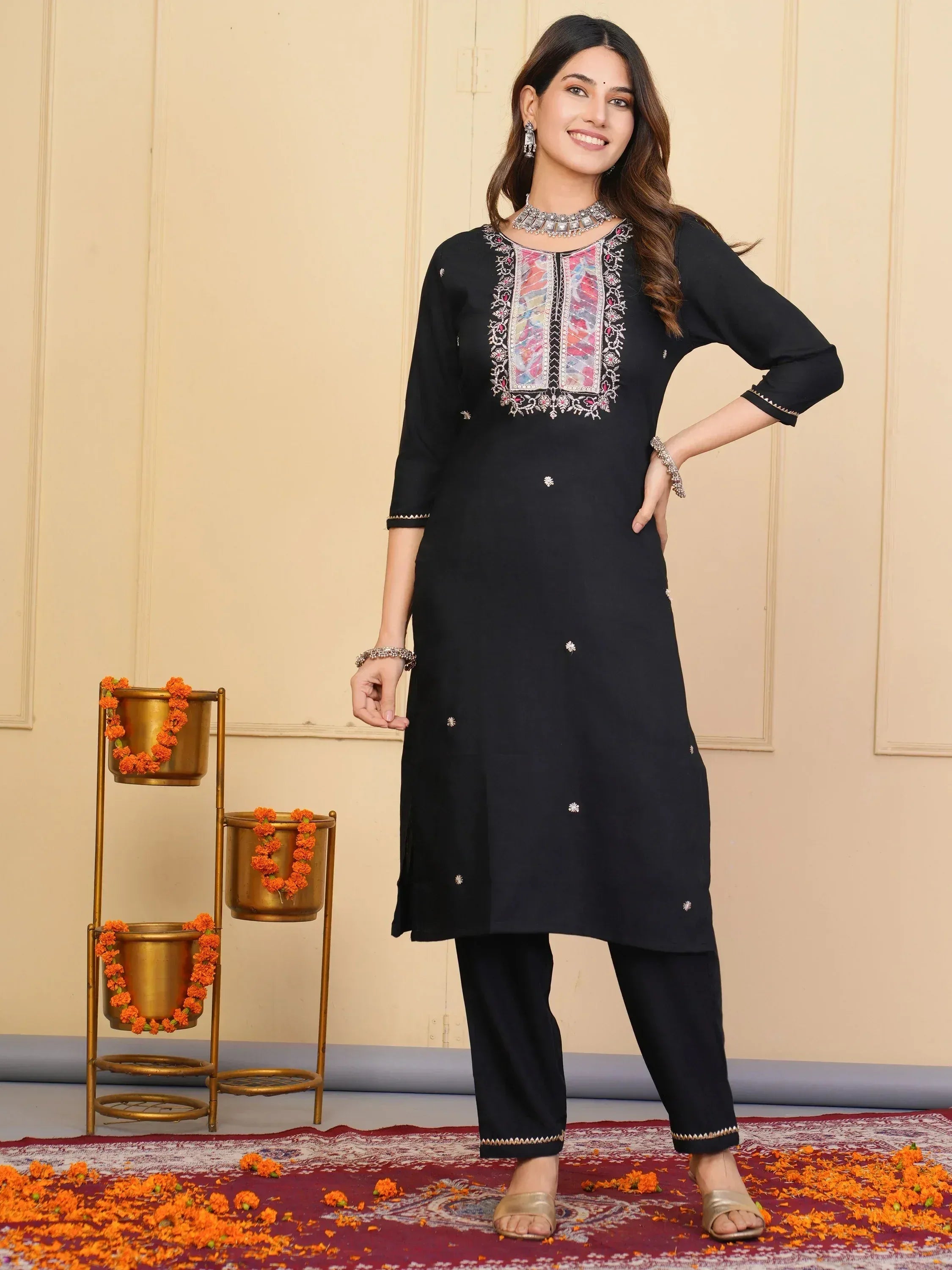 Black embroidered kurti with palazzo pants, perfect for Indian ethnic wear and festive occasions.