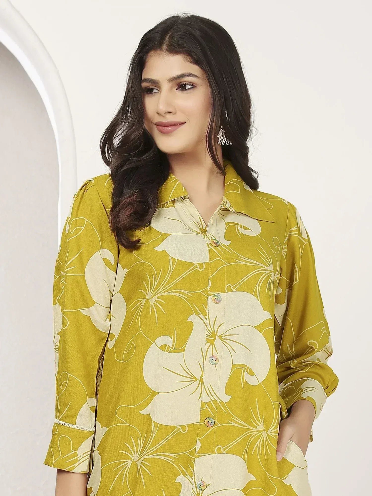 Yellow floral print kurta with white blooms, button front, and rolled sleeves for ethnic wear