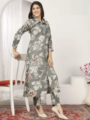 Woman in grey floral ethnic kurta set from Ethnic Plus, standing indoors on a patterned rug