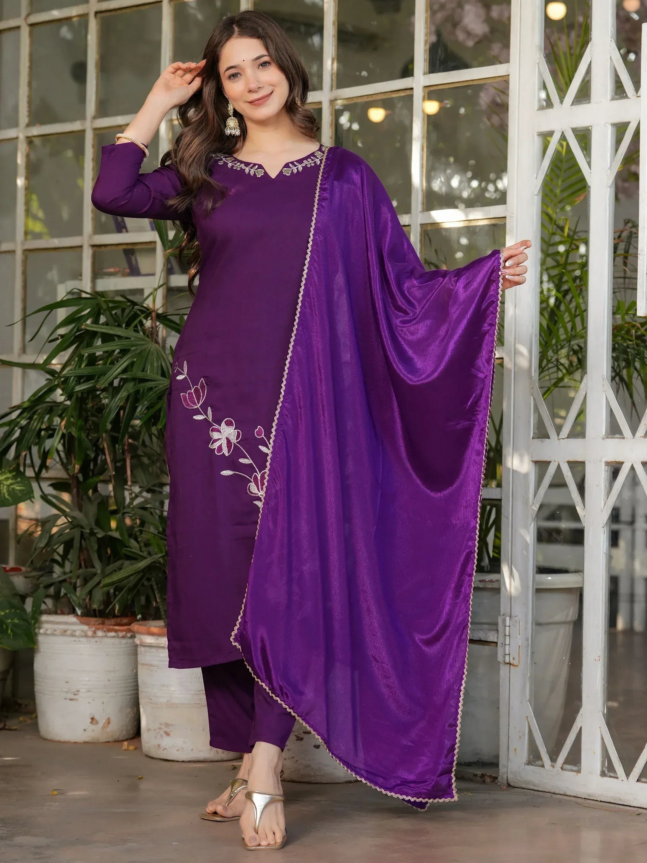 Purple ethnic salwar kameez with floral embroidery and cape-style dupatta, perfect for Indian occasions.