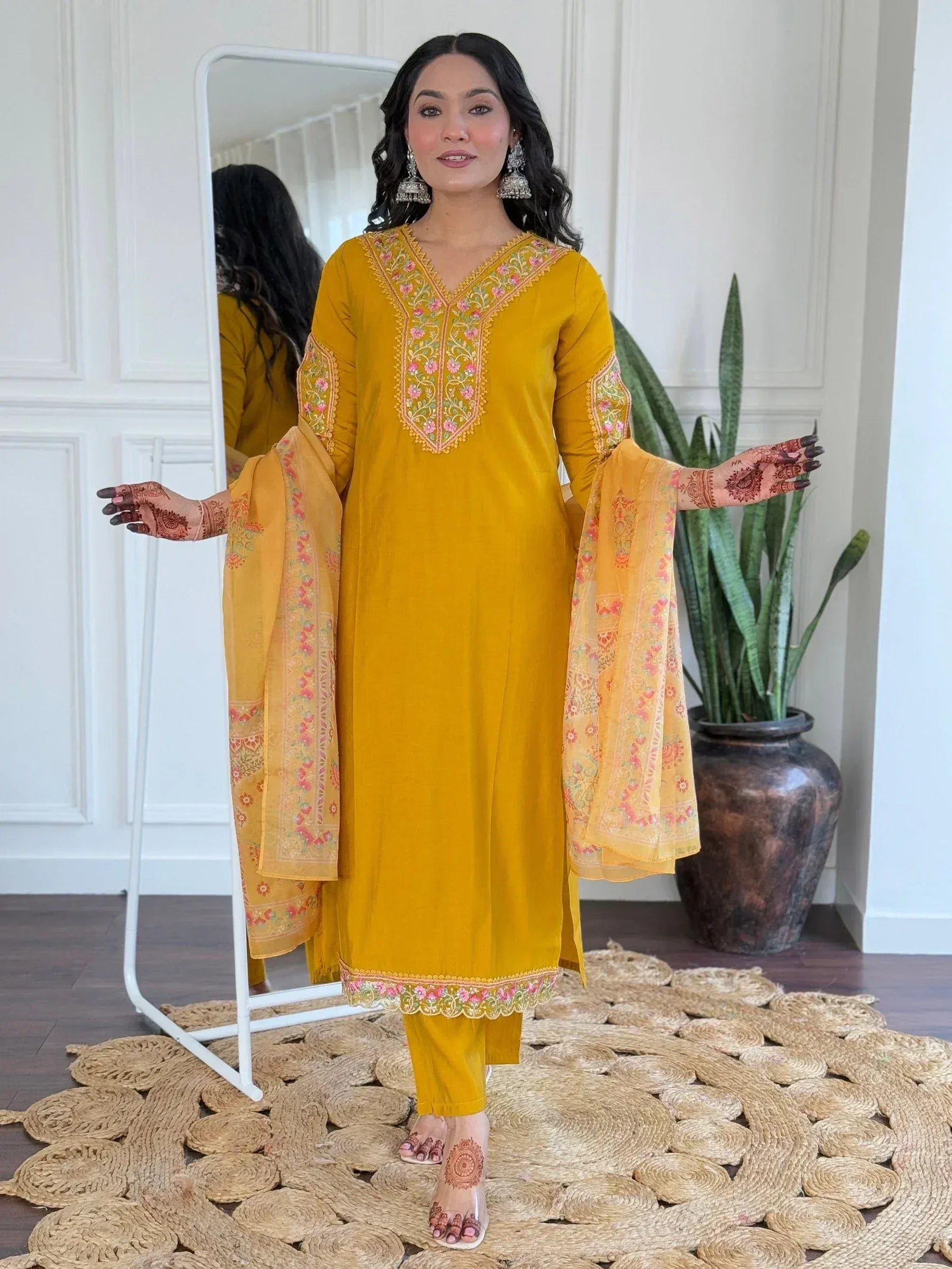 Yellow embroidered salwar kameez with floral dupatta, perfect for Indian ethnic wear occasions