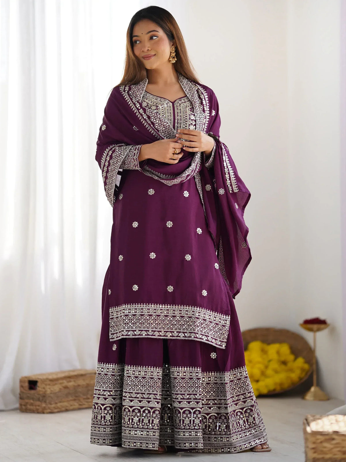 Purple embroidered salwar kameez with mirror work, perfect for Indian ethnic wear and festive occasions