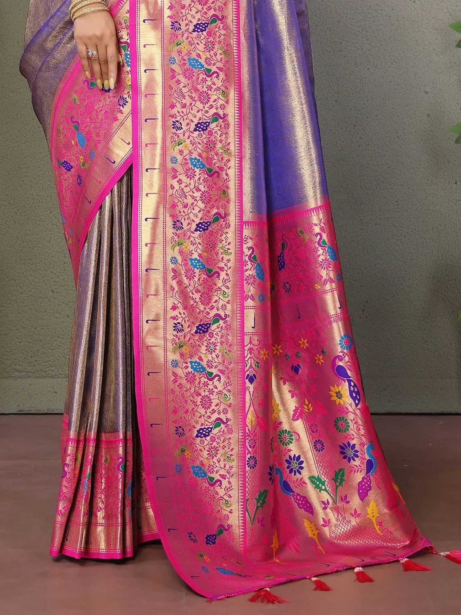 Vibrant pink and purple saree with peacock and floral embroidery, perfect for Indian ethnic wear.