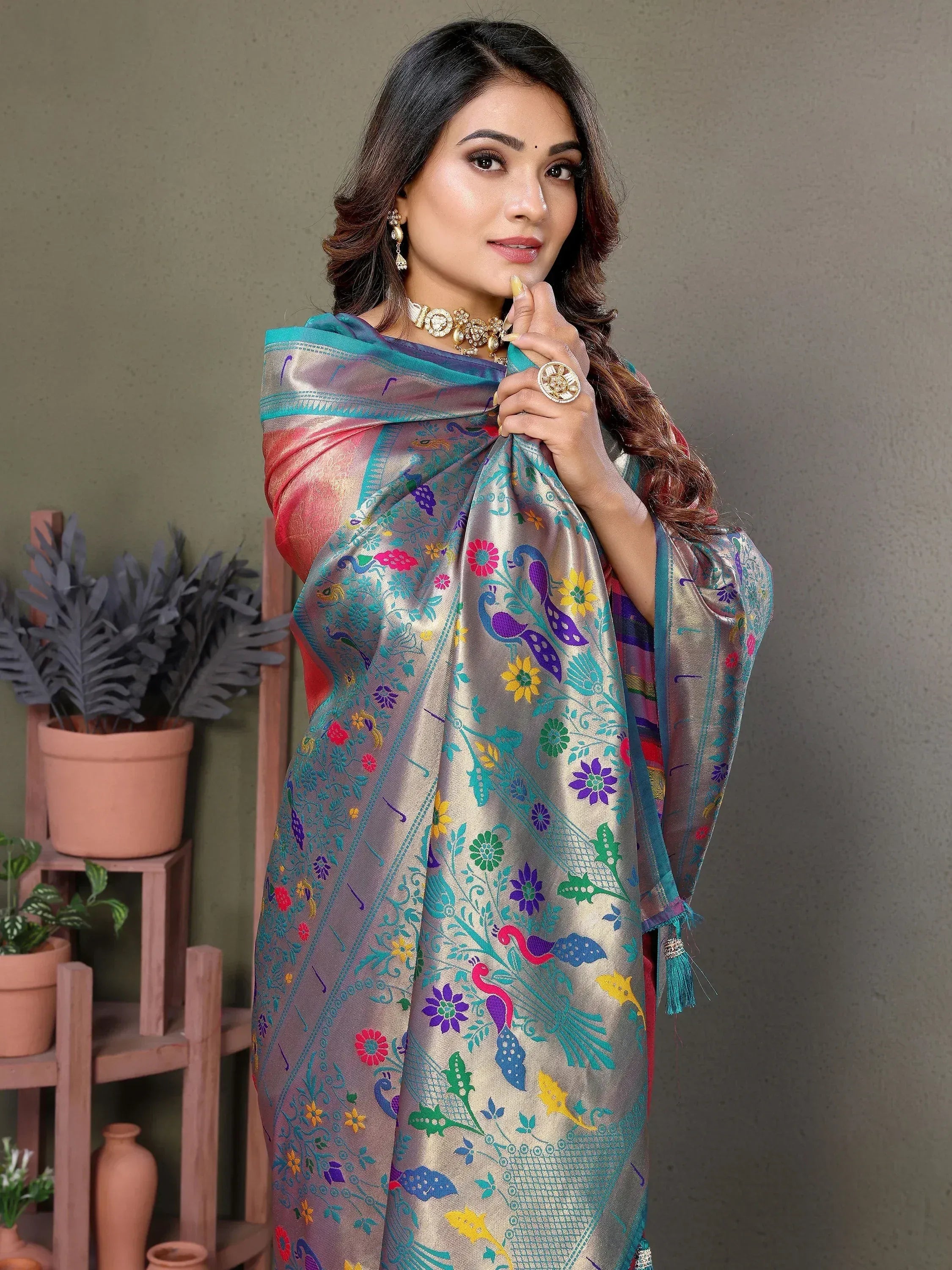 Colorful peacock and floral print saree with vibrant border, perfect for ethnic occasions