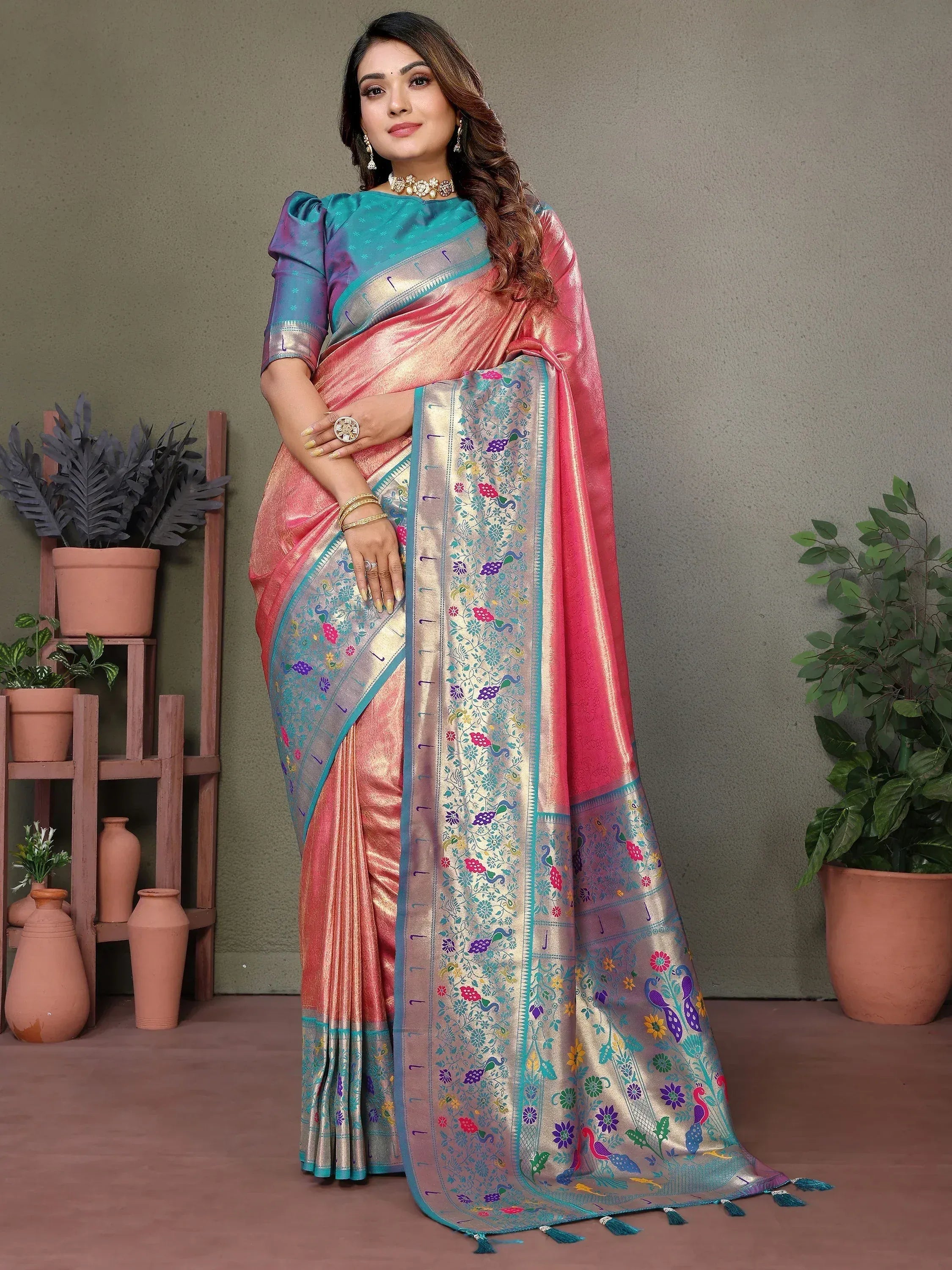 Elegant pink and blue saree with peacock and floral motifs, perfect for Indian ethnic wear