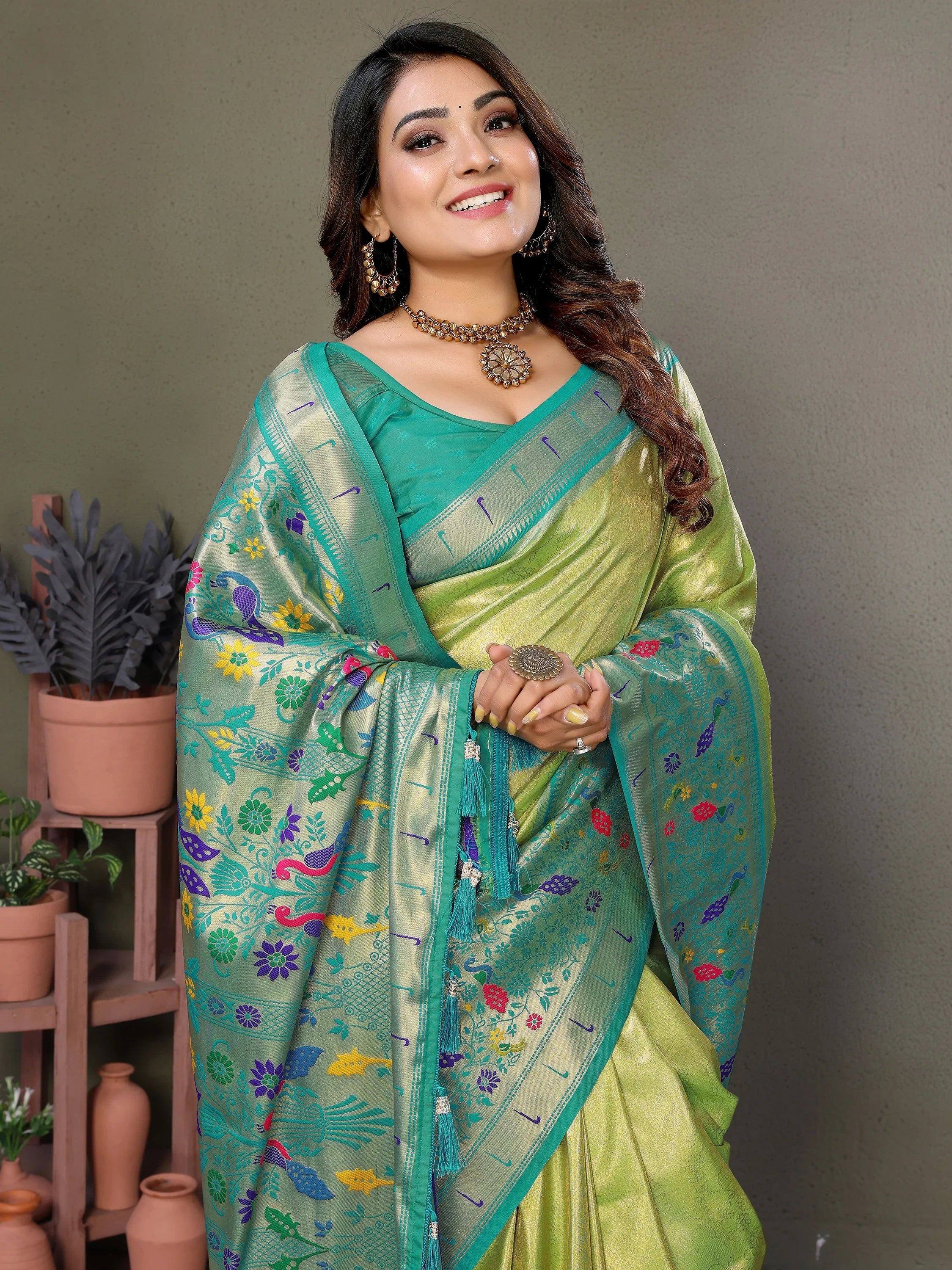 Green floral saree with peacock motifs, perfect for ethnic occasions