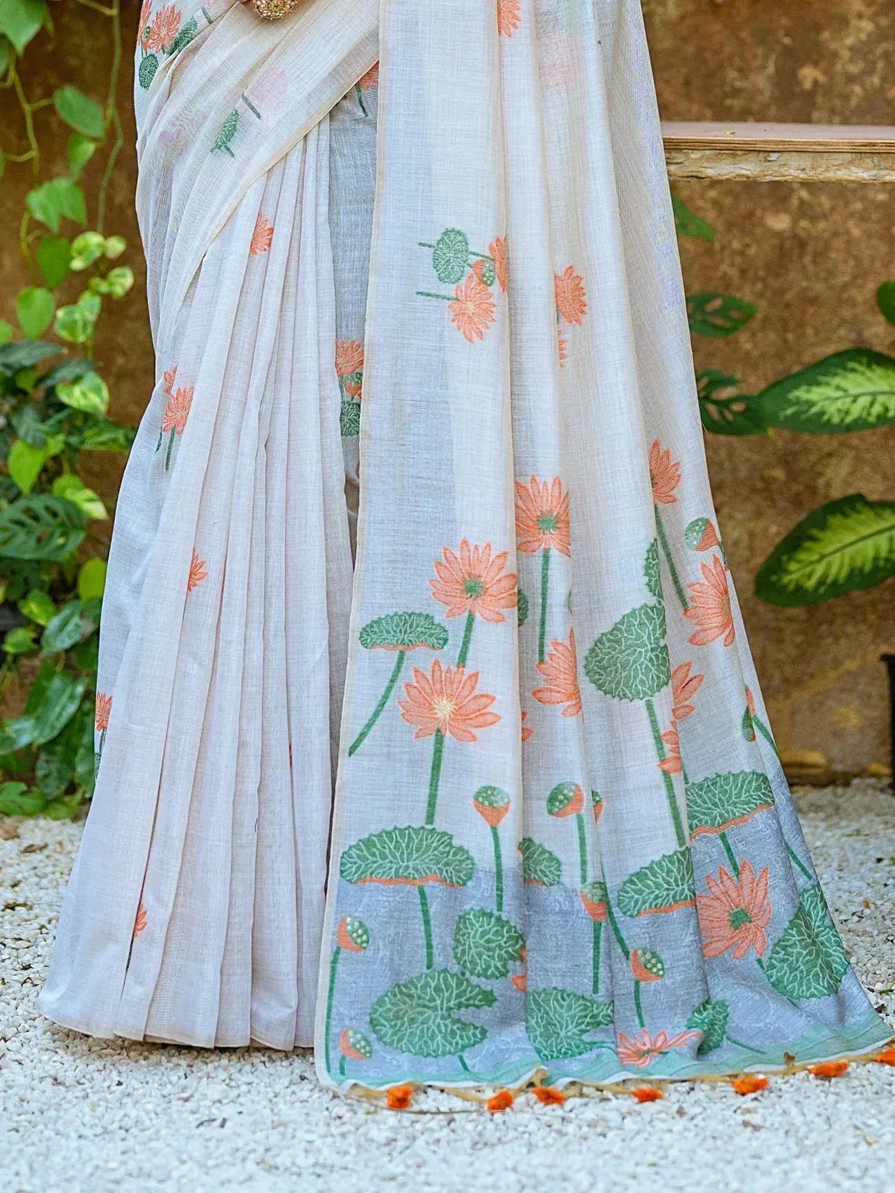 Elegant floral saree with lotus print, perfect for Indian ethnic wear occasions.