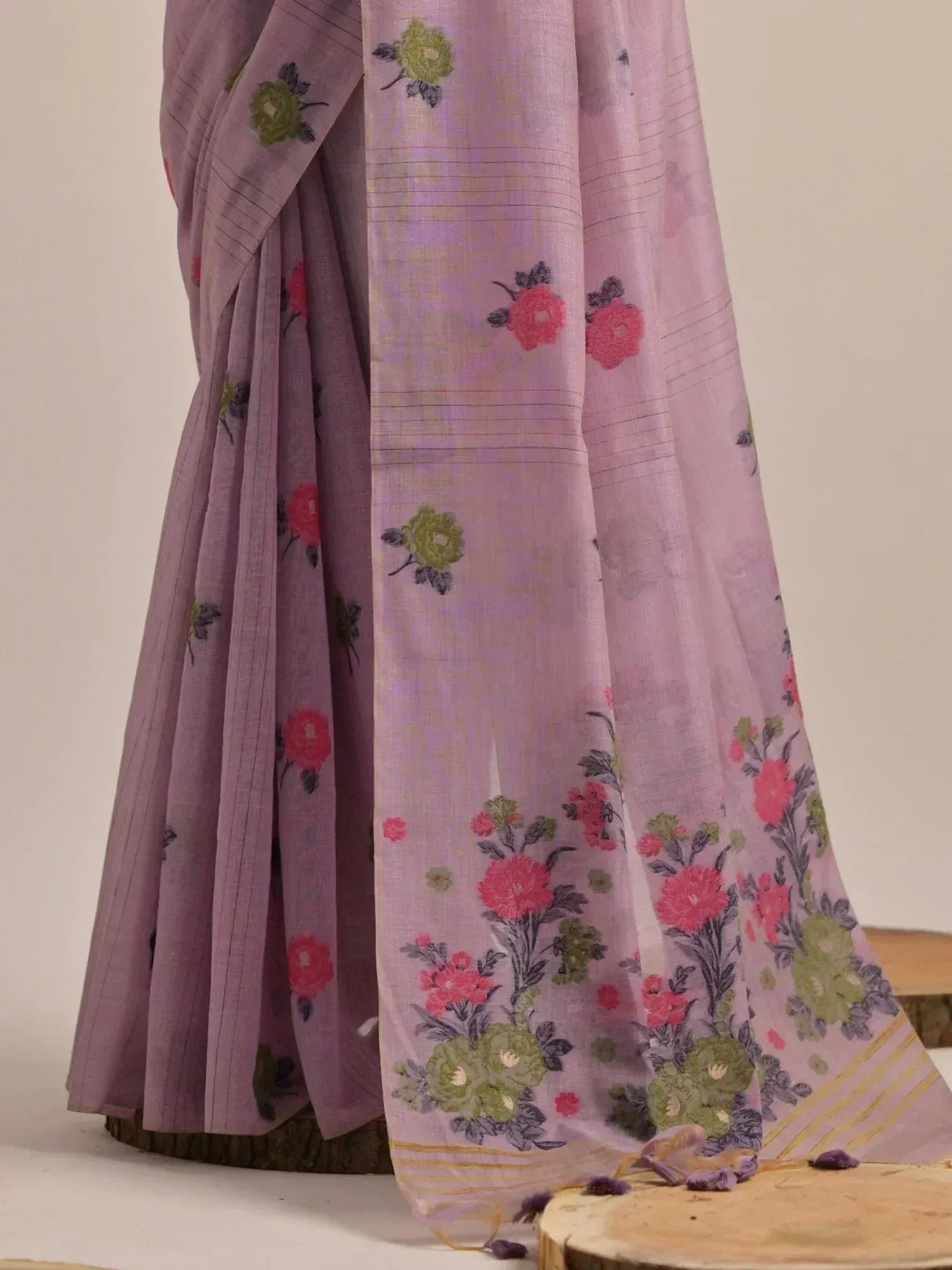 Purple floral saree with pink and green embroidery, elegant ethnic wear design