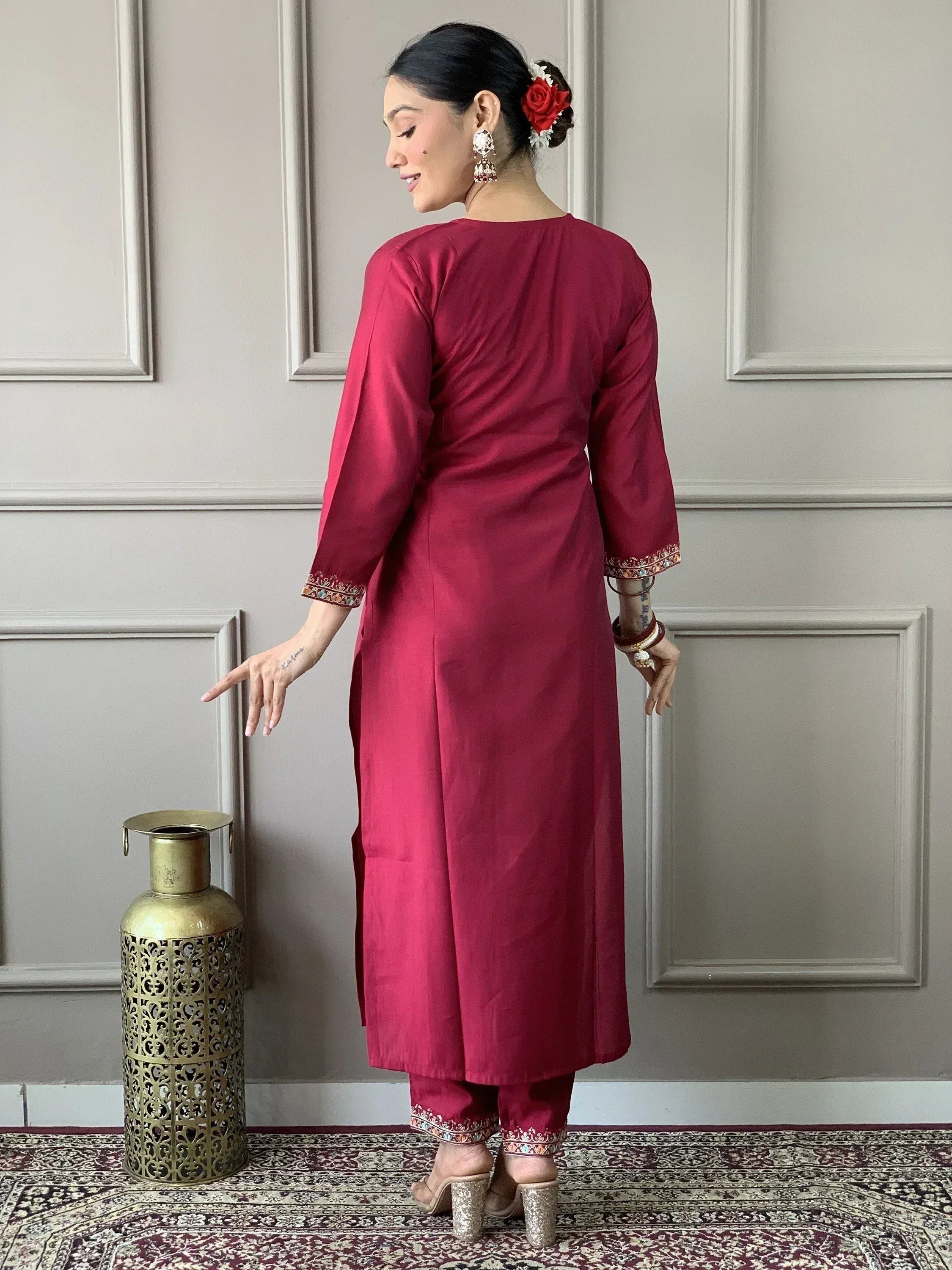 Maroon ethnic kurta with embroidered cuffs and pants, styled for Indian wear