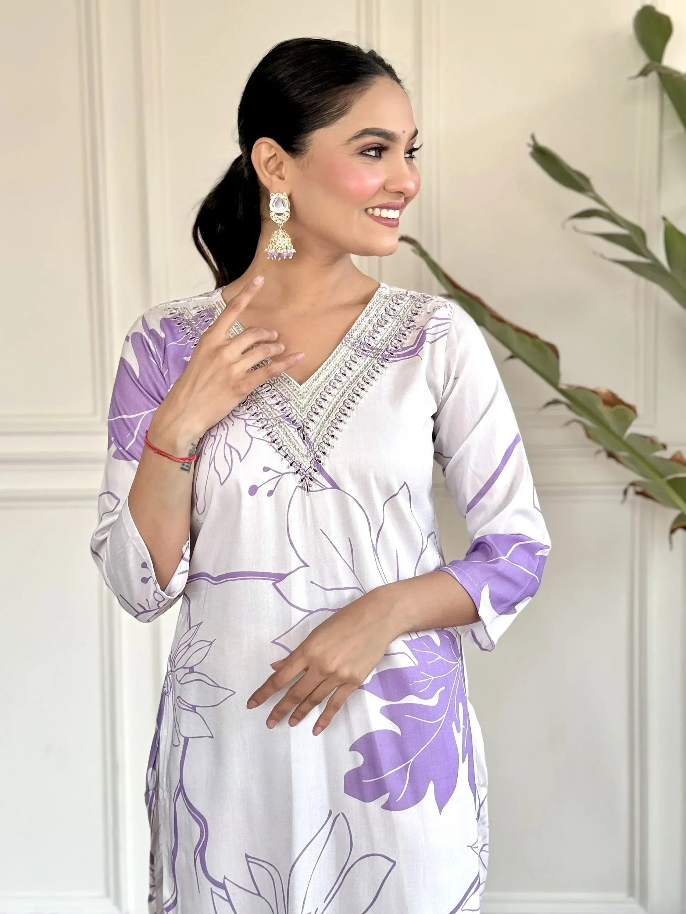 White and purple floral printed ethnic kurta with embroidered neckline, perfect for Indian wear