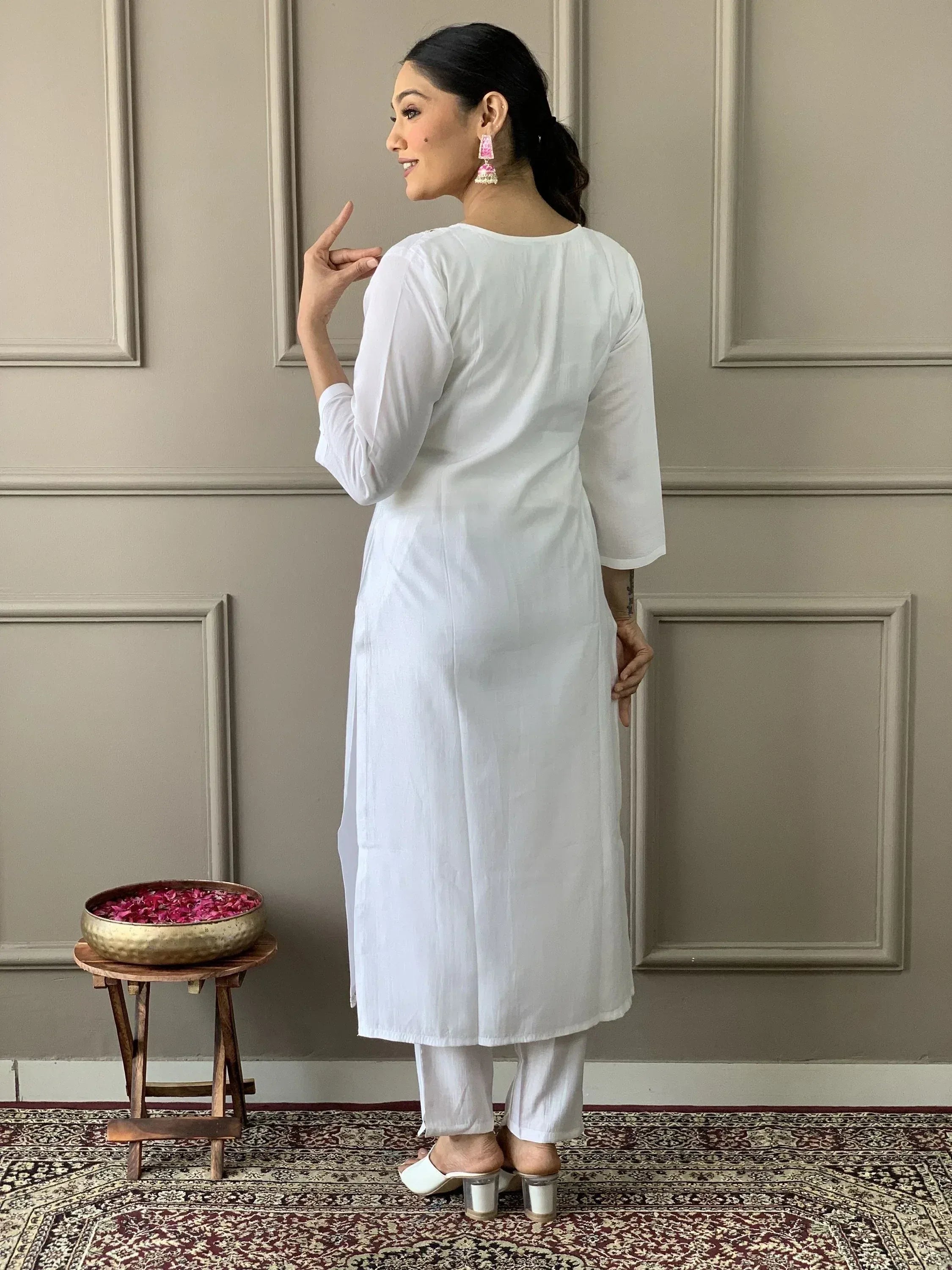 White cotton kurta with palazzo pants, ethnic Indian wear for women, styled with pink jhumka earrings