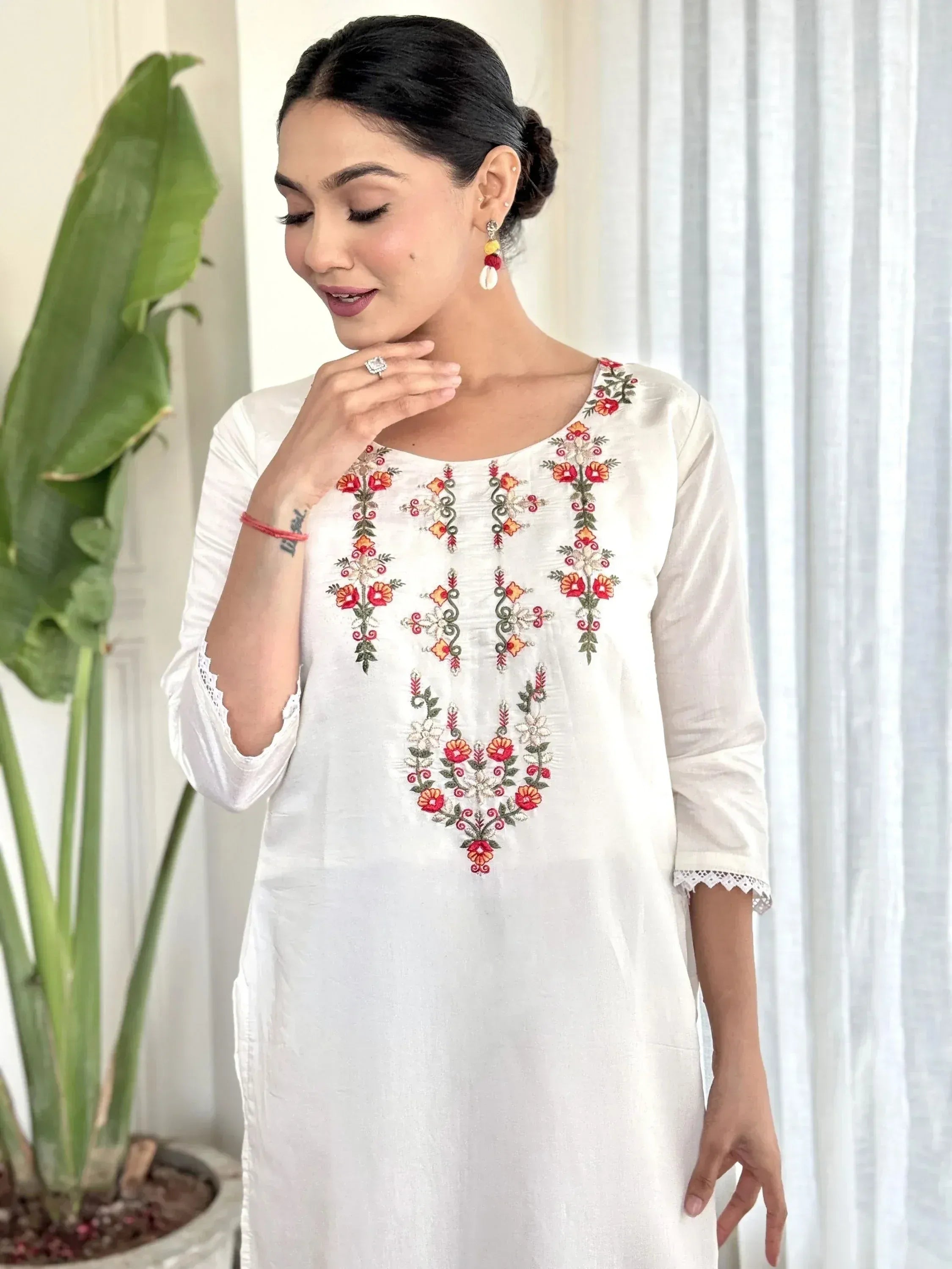 White embroidered kurta with floral design, ethnic wear for women