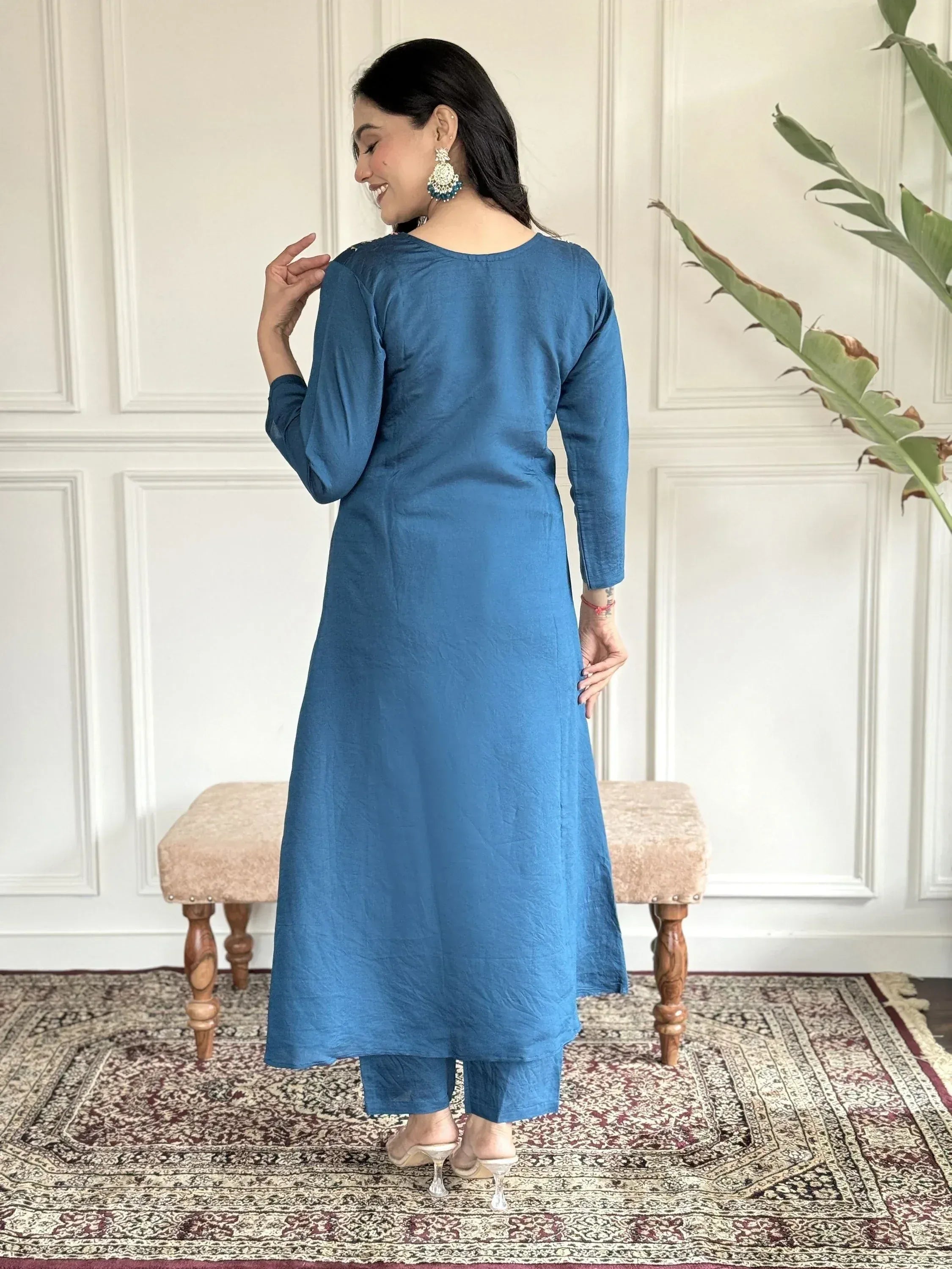 Blue ethnic kurta set with matching pants, styled with statement earrings for Indian wear