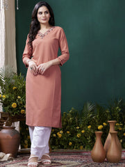 Woman in peach embroidered kurti and white pants, Indian ethnic wear, Ethnic Plus