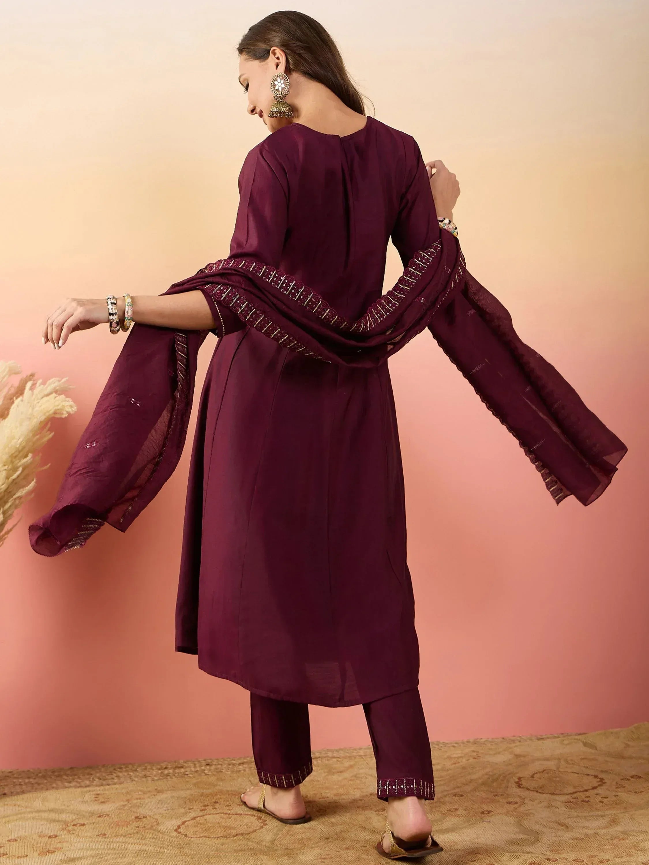 Elegant maroon ethnic kurta set with detailed embroidery and matching dupatta