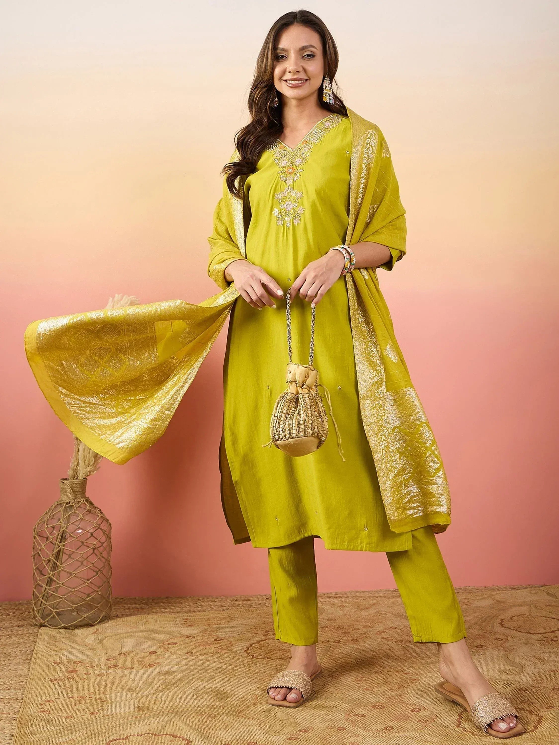Lime green embroidered salwar kameez with gold dupatta, perfect for ethnic wear and festive occasions