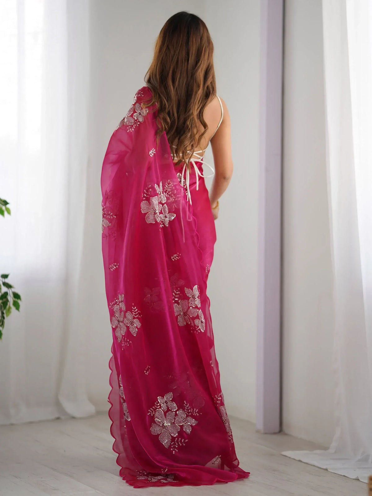 Pink embroidered saree with floral sequin work, back view, Indian ethnic wear