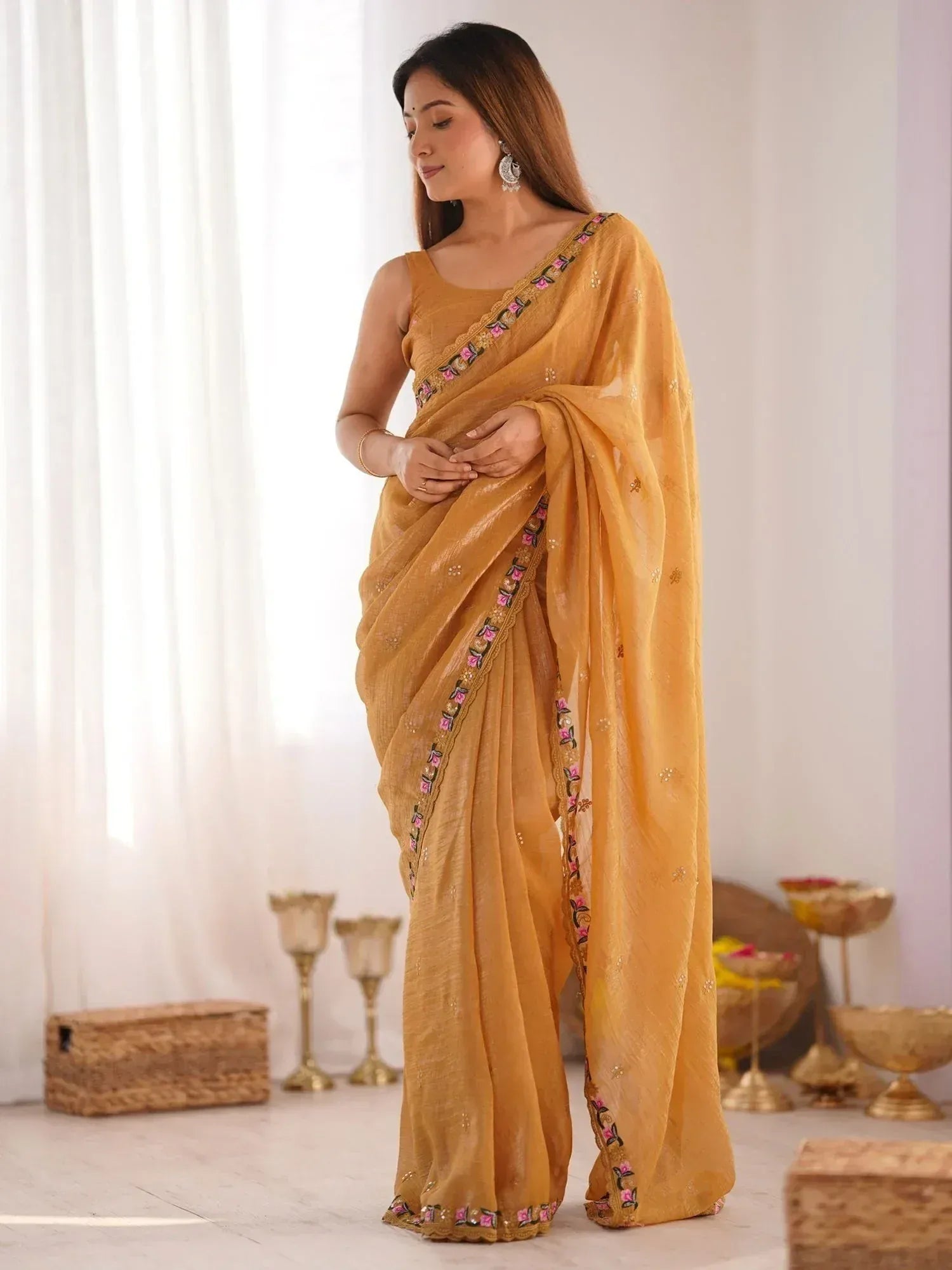 Mustard yellow saree with floral embroidery, perfect for Indian ethnic wear occasions