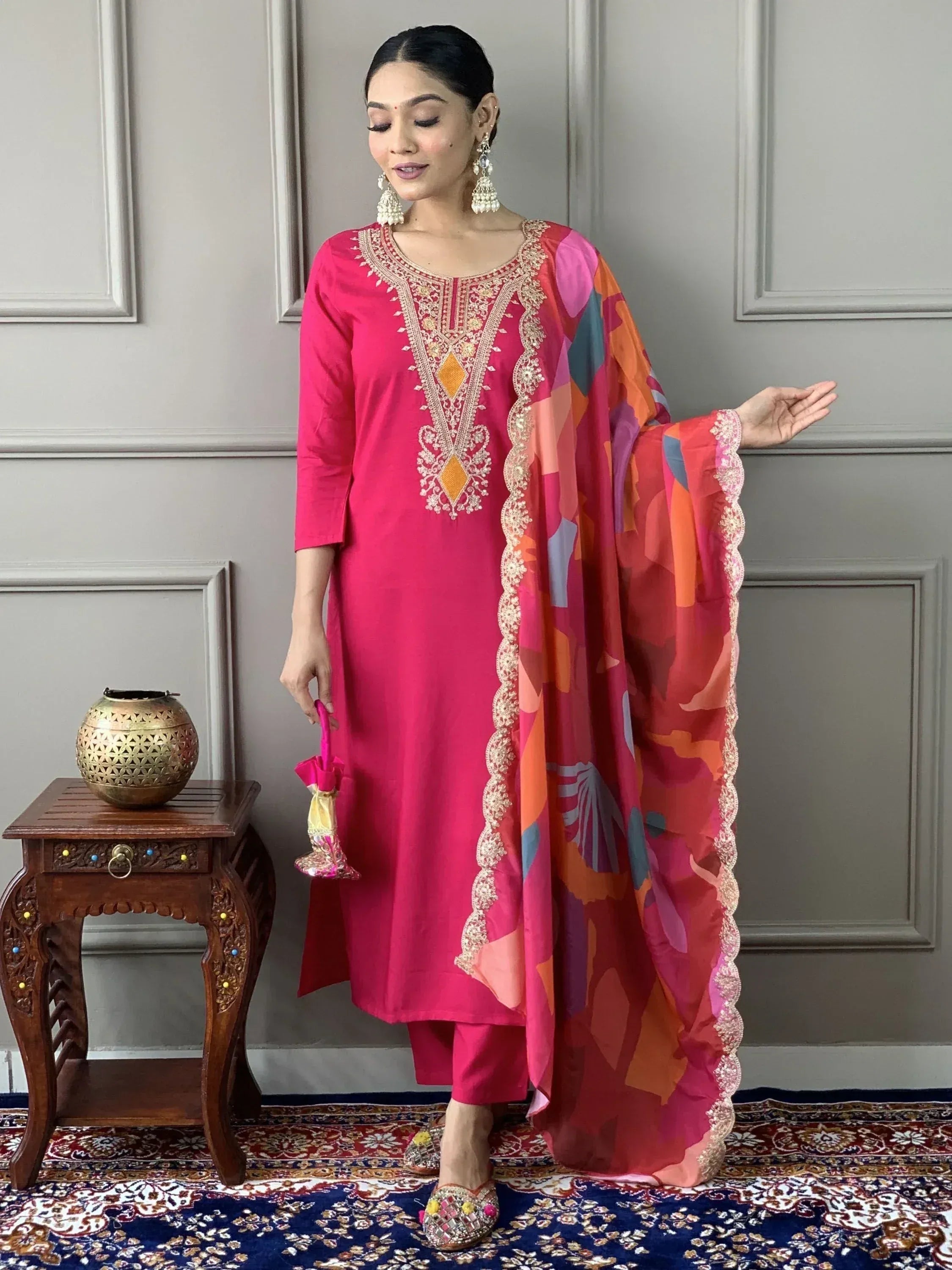 Pink embroidered salwar kameez with colorful dupatta, traditional Indian ethnic wear