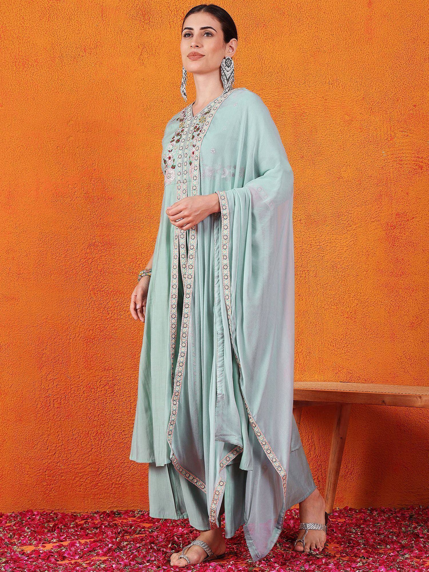 Mint green embroidered salwar kameez with floral detailing, perfect for ethnic occasions