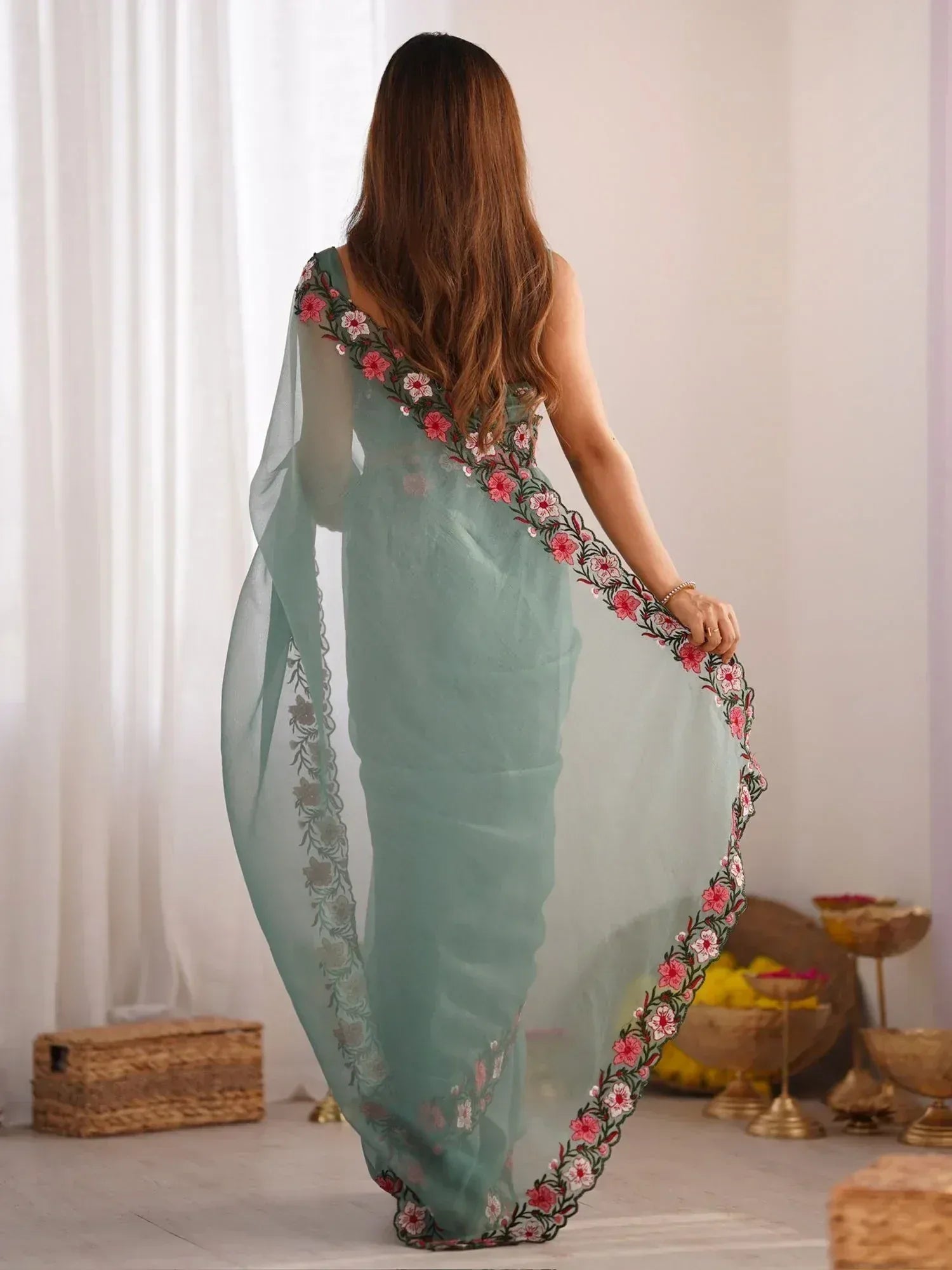 Mint green saree with pink floral embroidery, elegant Indian ethnic wear for women