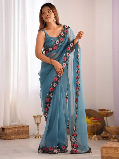 Fascinating Blue Embroidered Georgette Party Wear Saree With Blouse