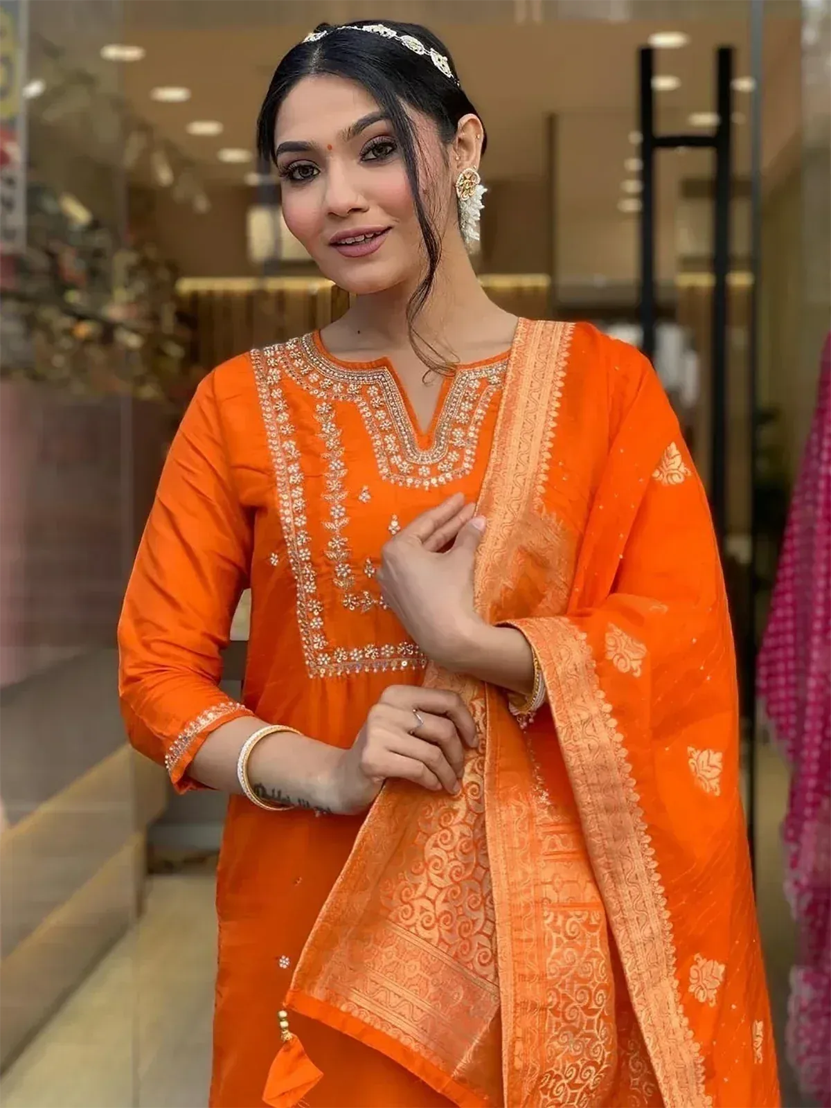 Orange embroidered ethnic salwar kameez with dupatta, perfect for festive occasions and traditional events